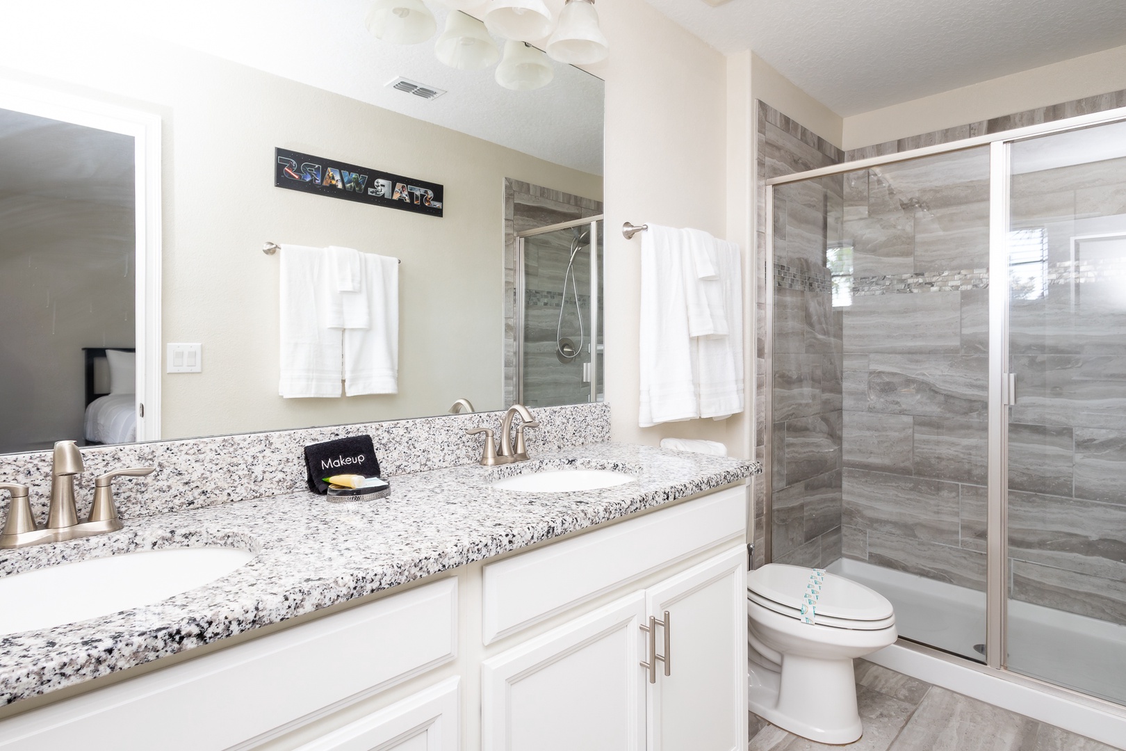 This ensuite features a luxurious spa-like glass shower