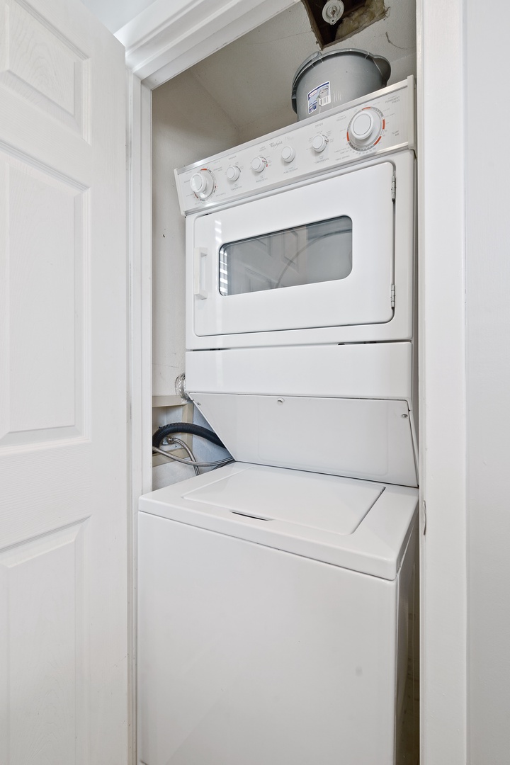stackable wash & dryer in laundry closet