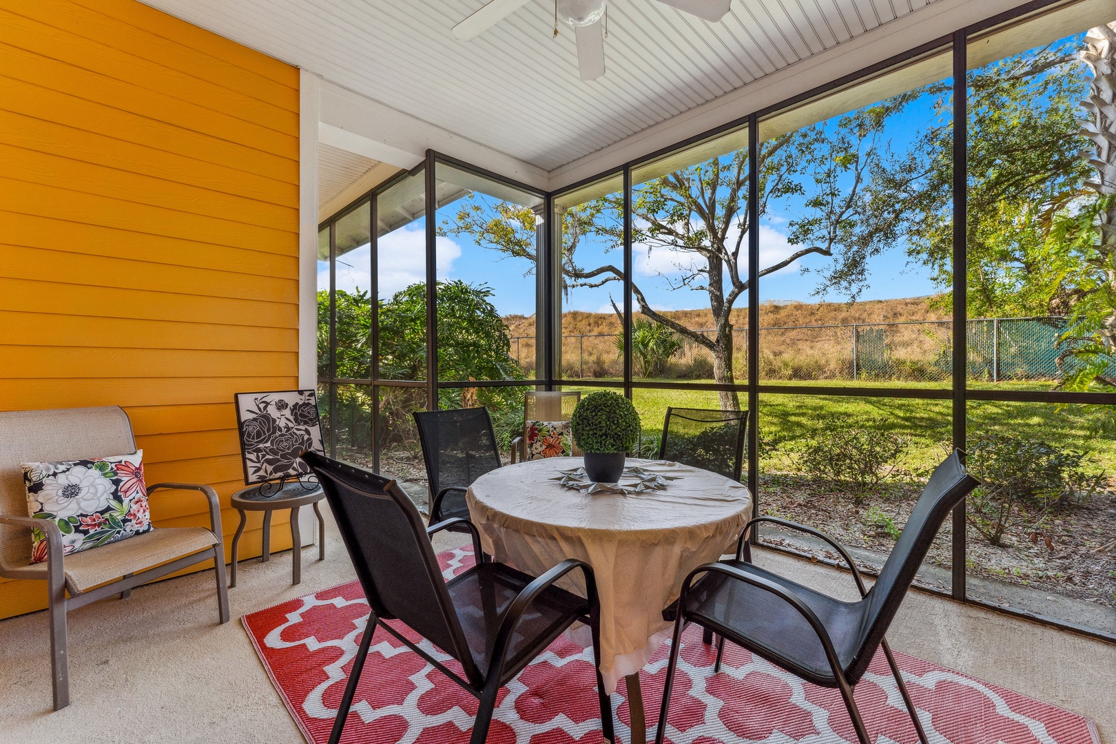 Dine alfresco or enjoy a cocktail on the screened patio