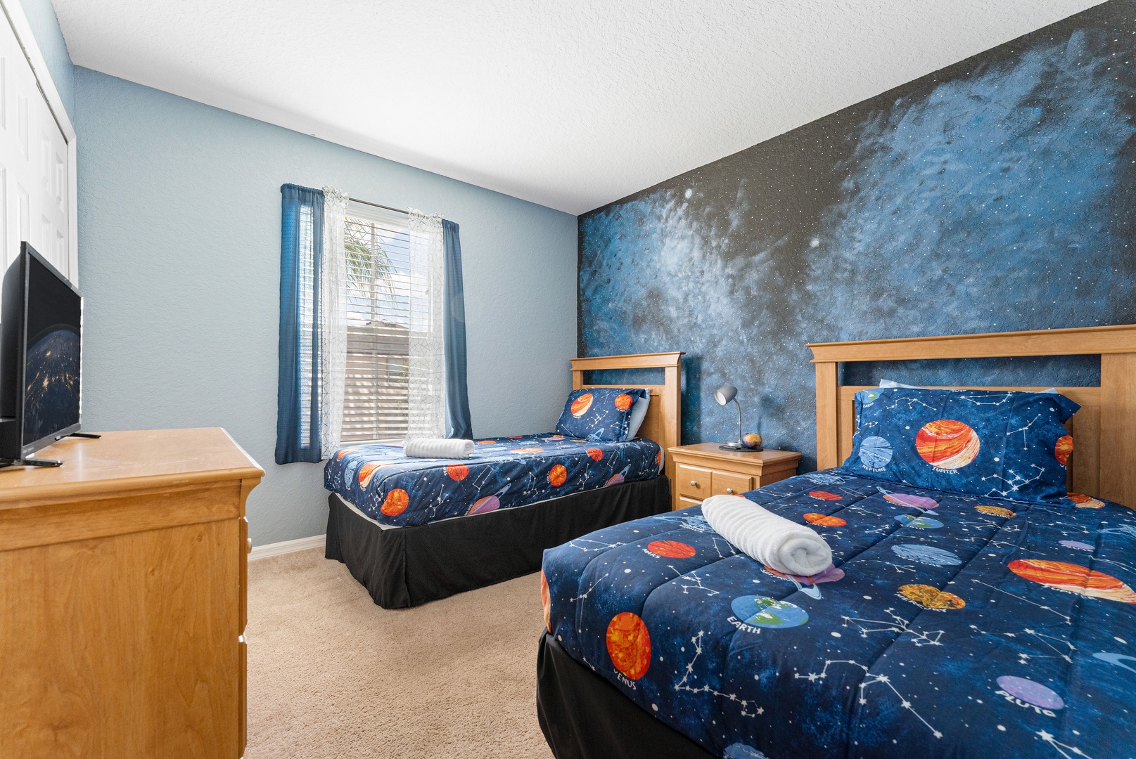 Outta this world! Bedroom 2 (2nd Floor) with 2 twin beds, and Smart TV