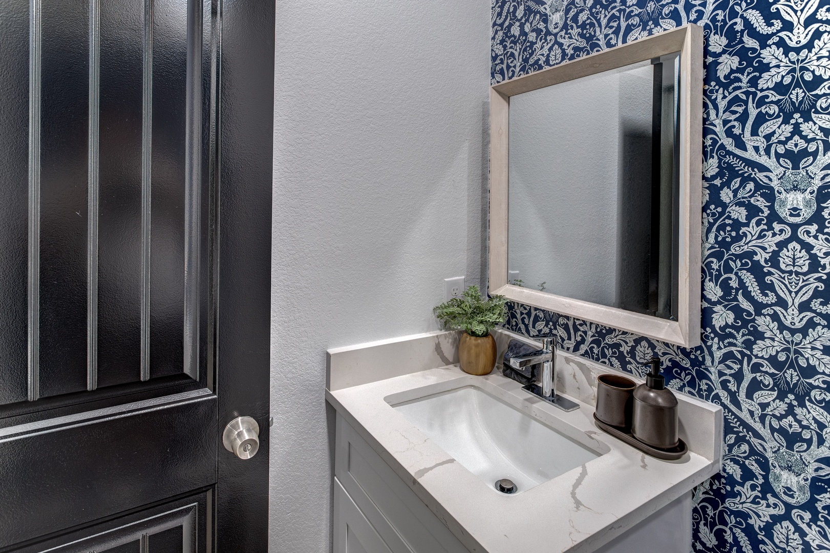 The final full bath includes a single vanity & walk-in shower