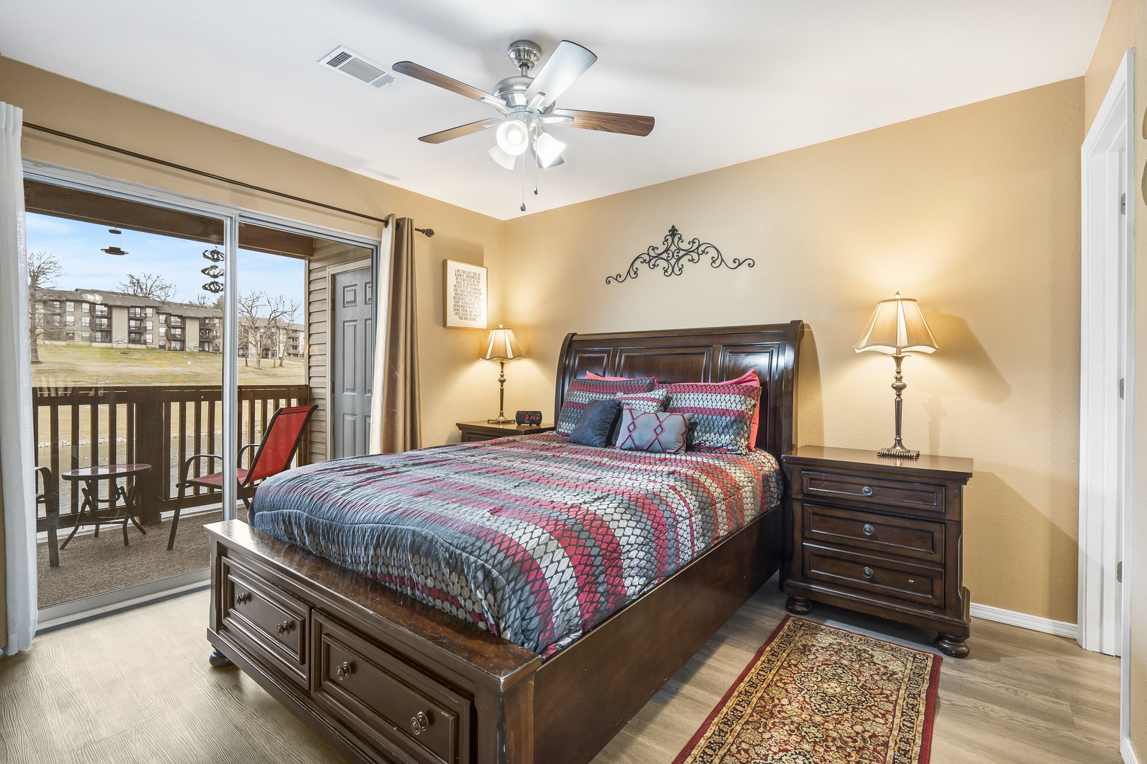 The master queen suite boasts a private ensuite, Smart TV, & deck access