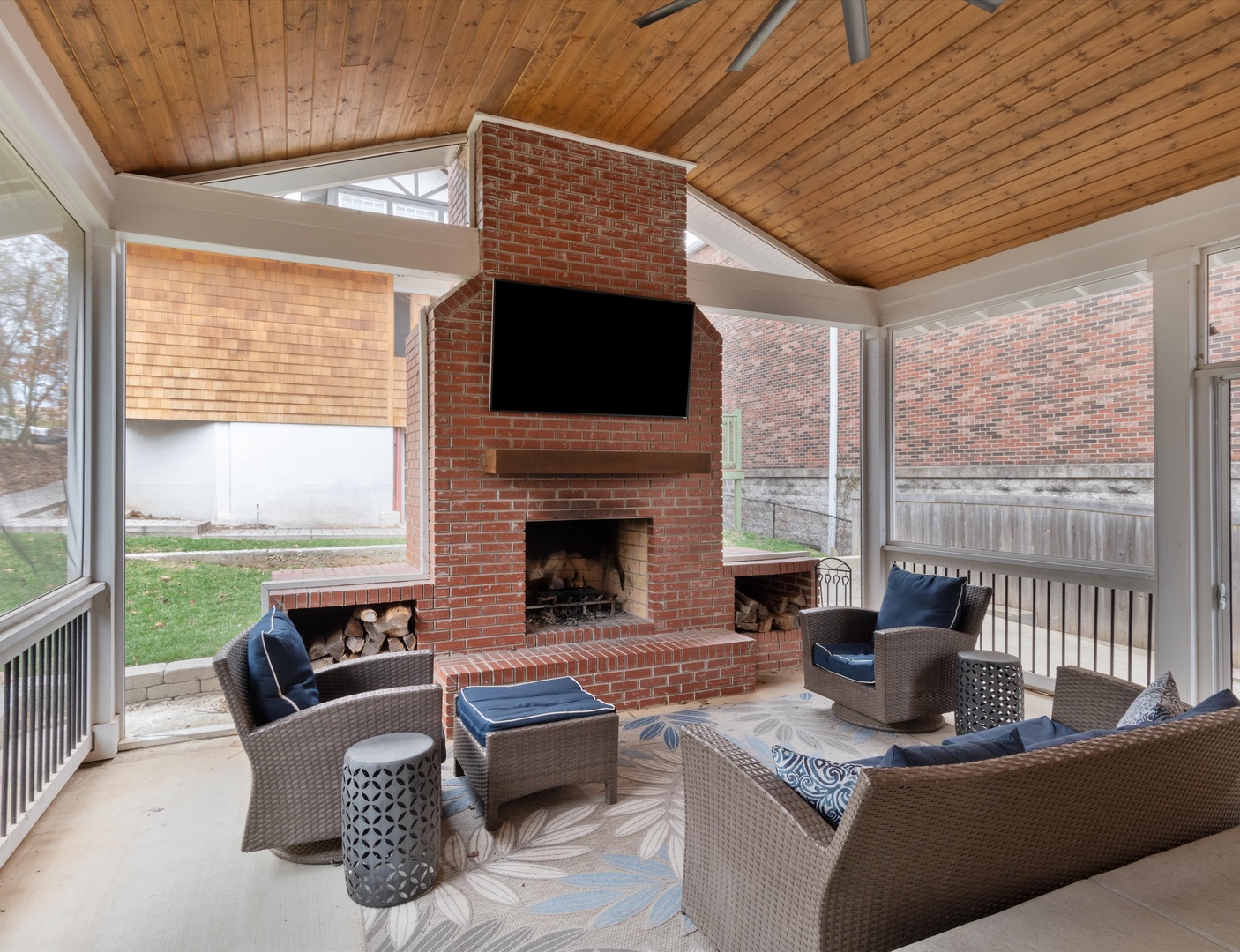 Come together and enjoy the ambiance of the outdoor fireplace and TV