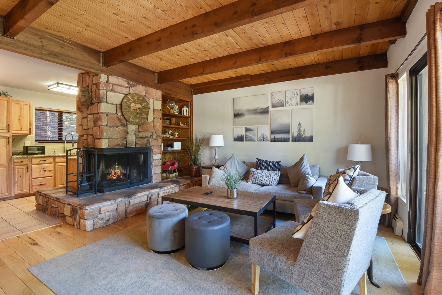 Unit #2: Elegant, rustic finishes compliment the comfy furnishings in the living room