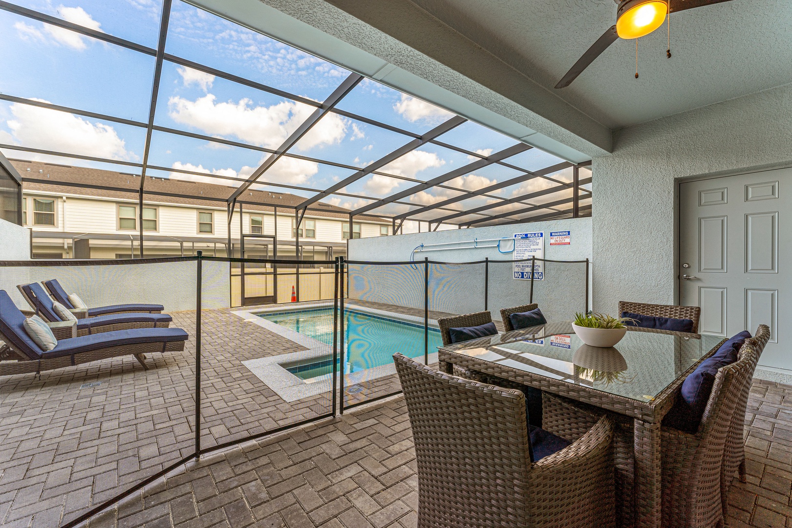 Enjoy a meal or drink in the outdoor seating by the Pool