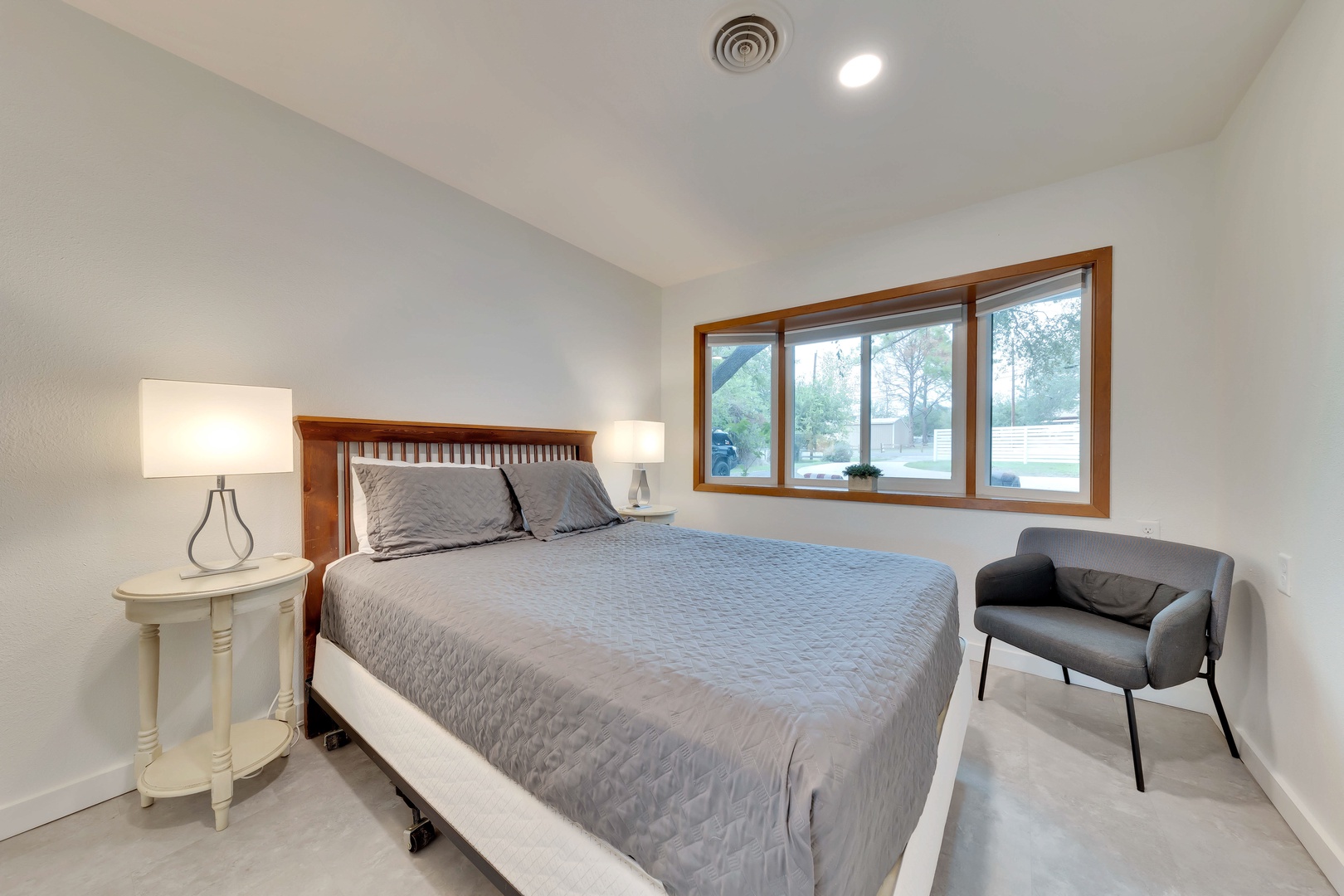Enjoy the peace & quiet of the 3rd bedroom, with a queen bed & bay window
