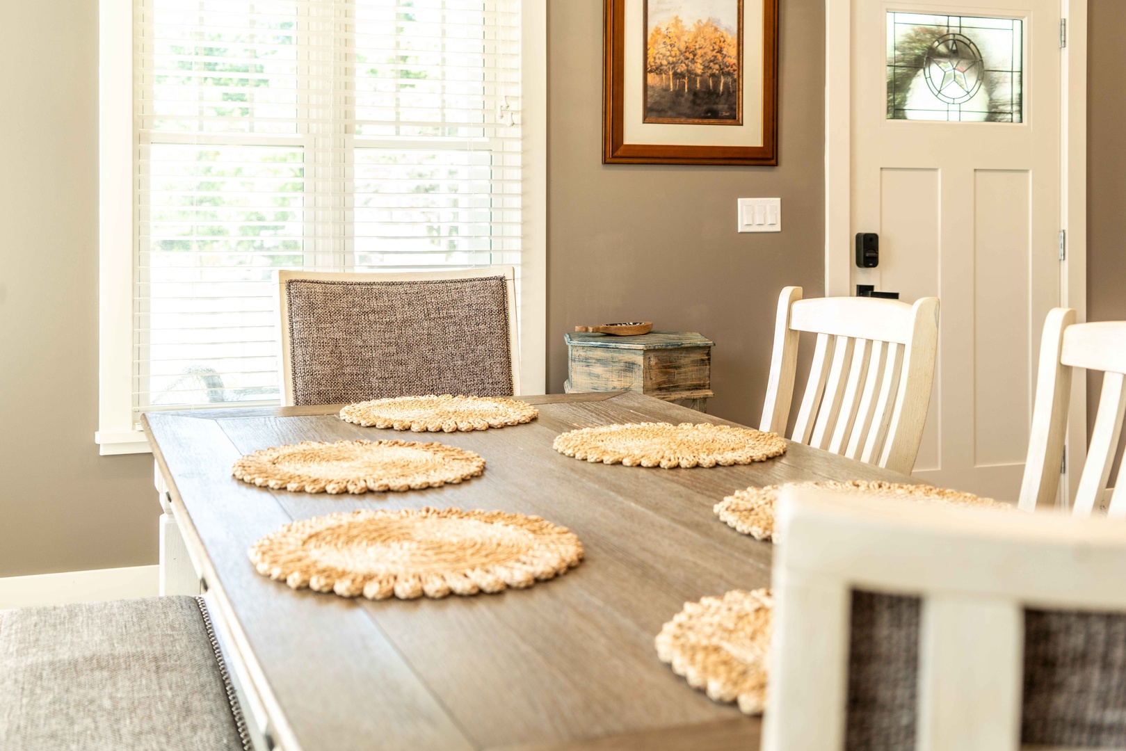 Gather for meals together at the elegant dining table, with seating for 6