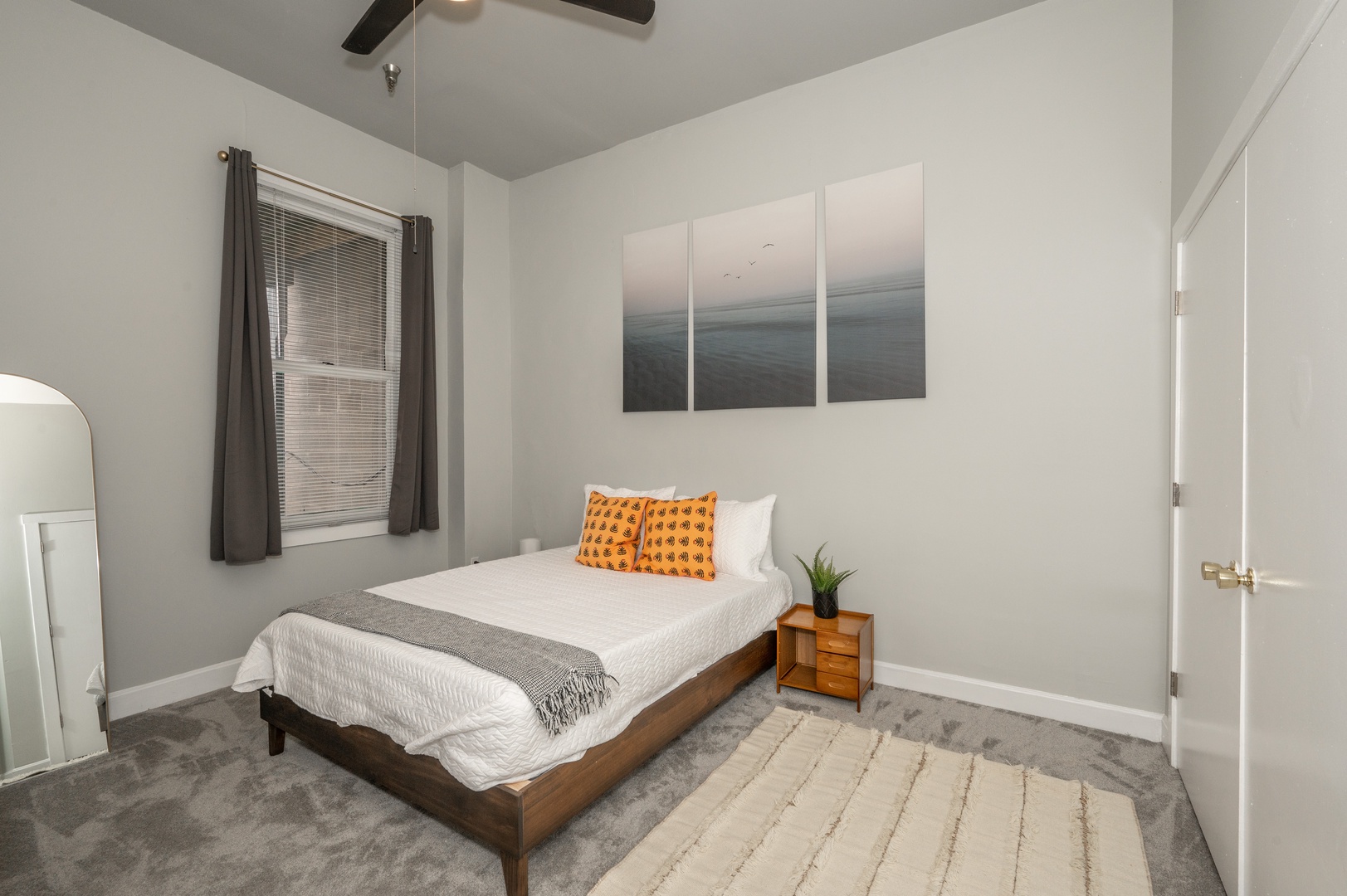 Get away from it all in your Queen Bedroom with Smart TV and Ceiling Fan