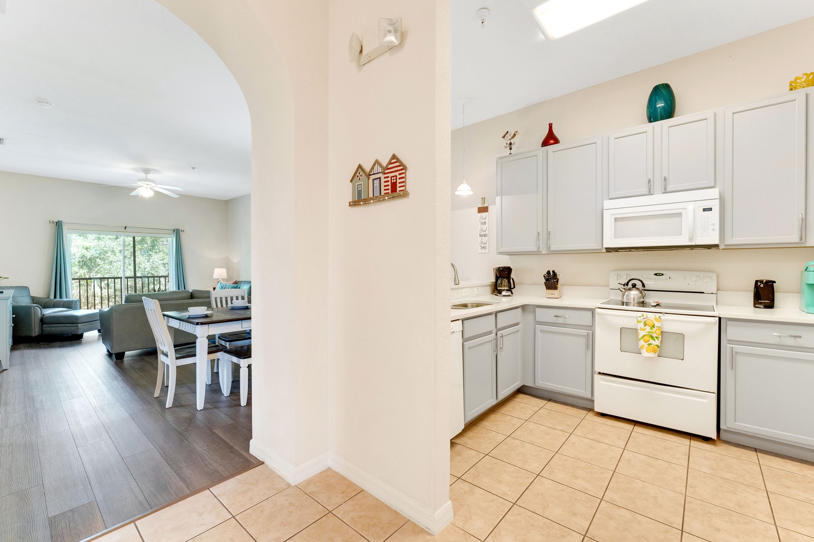 The open, airy kitchen offers ample space & all the comforts of home