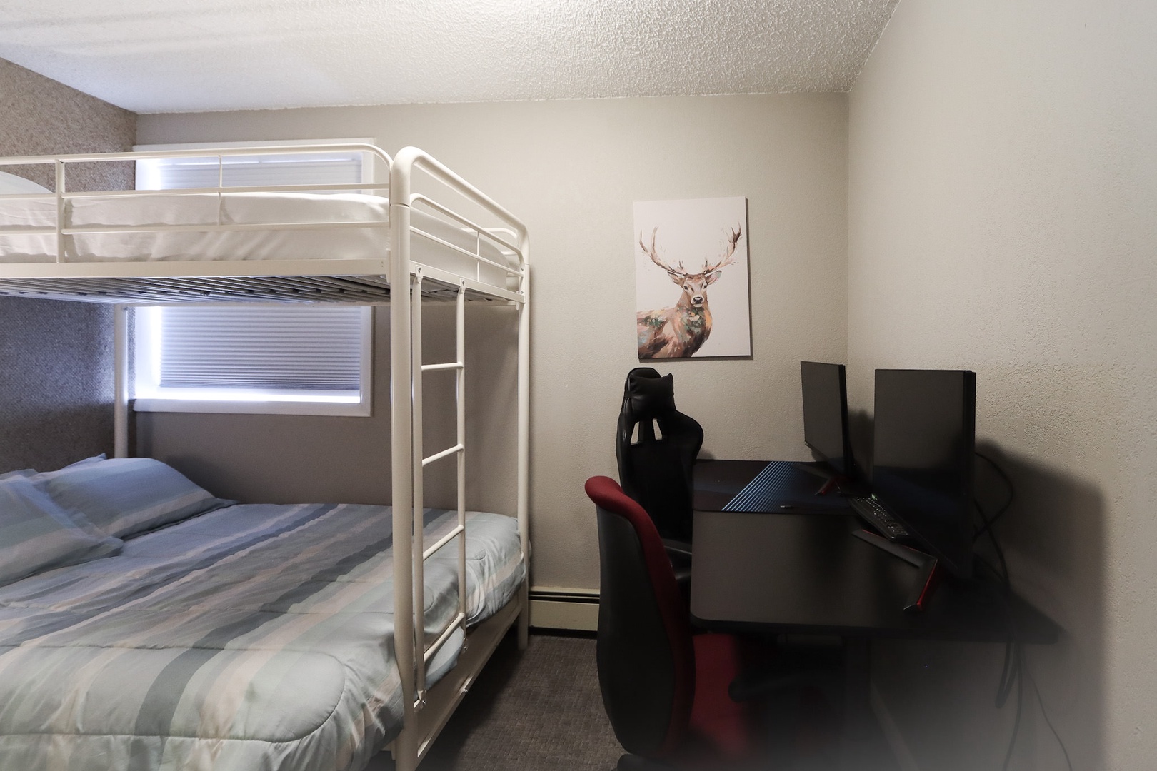 Bedroom 1 with Twin/Full bunk bed and gaming/work station