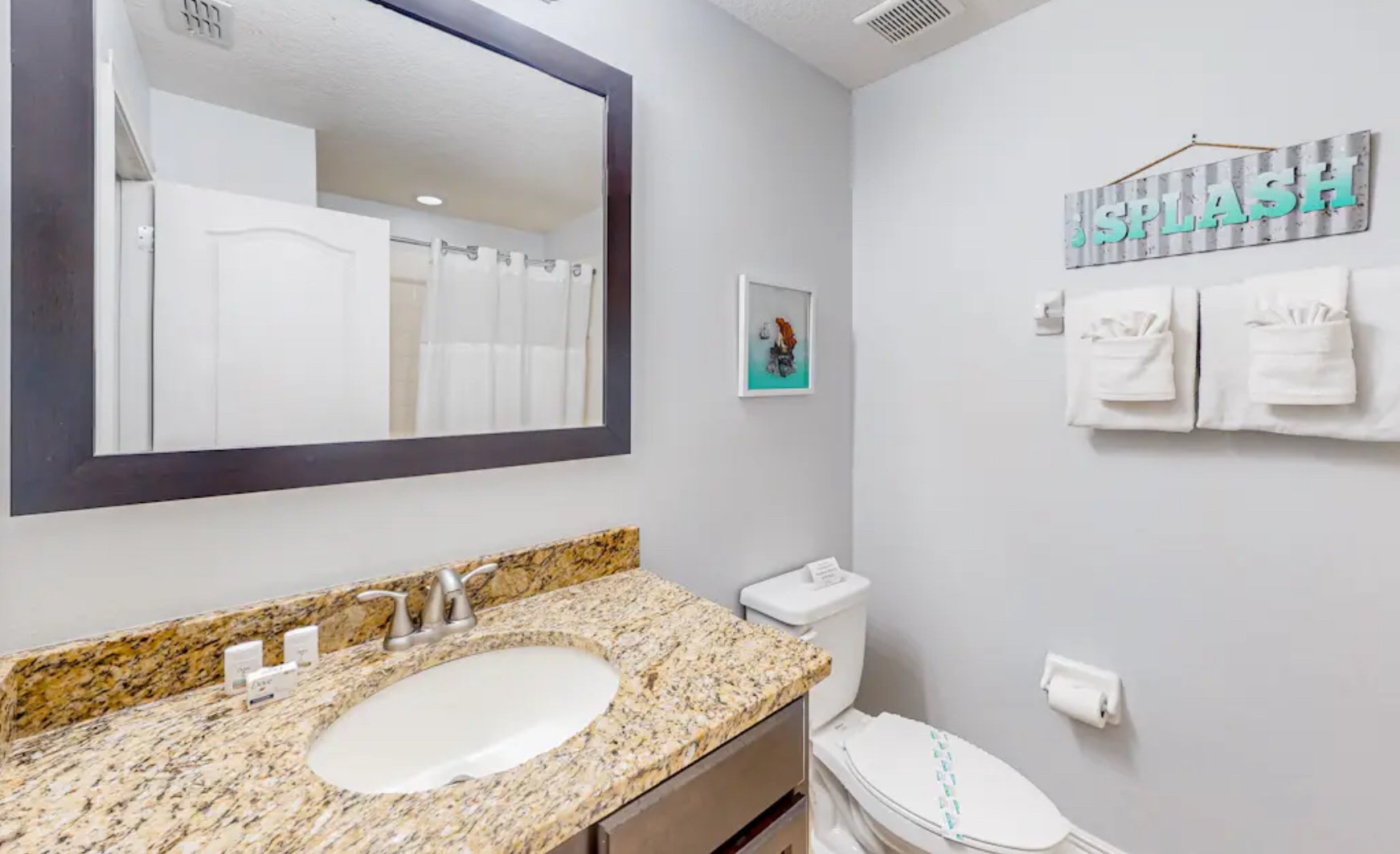 The final 2nd floor full bath features a single vanity & shower/tub combo