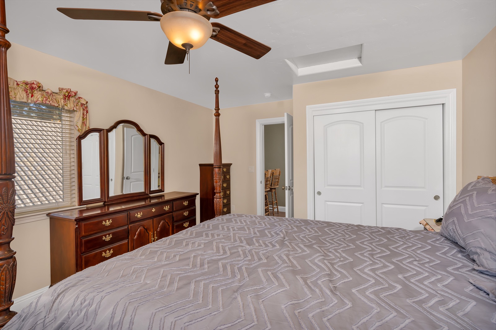 The 1st of 2 second-floor bedrooms offers a queen bed & Smart TV