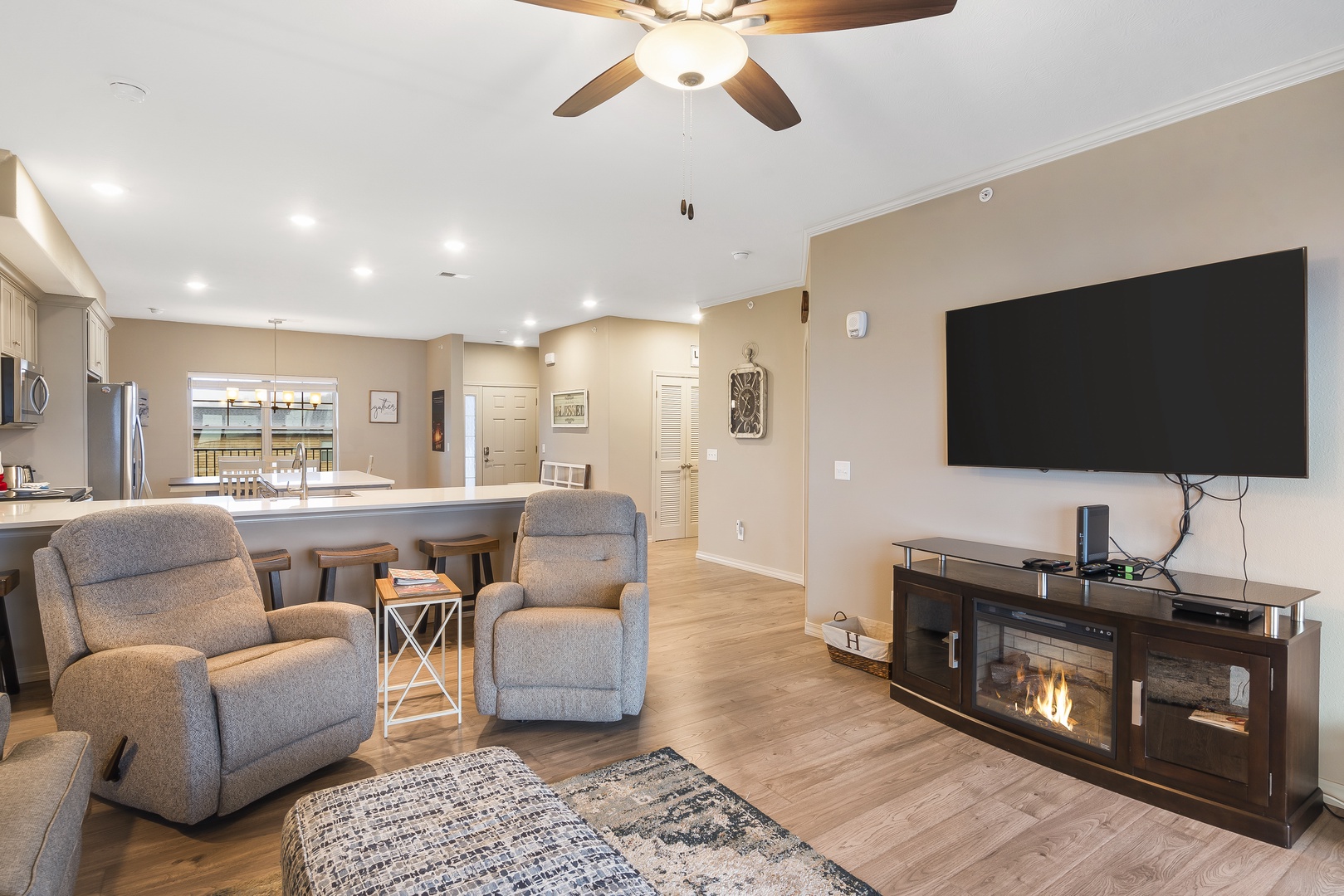 Curl up in the inviting living room & stream your favorites by the fireplace