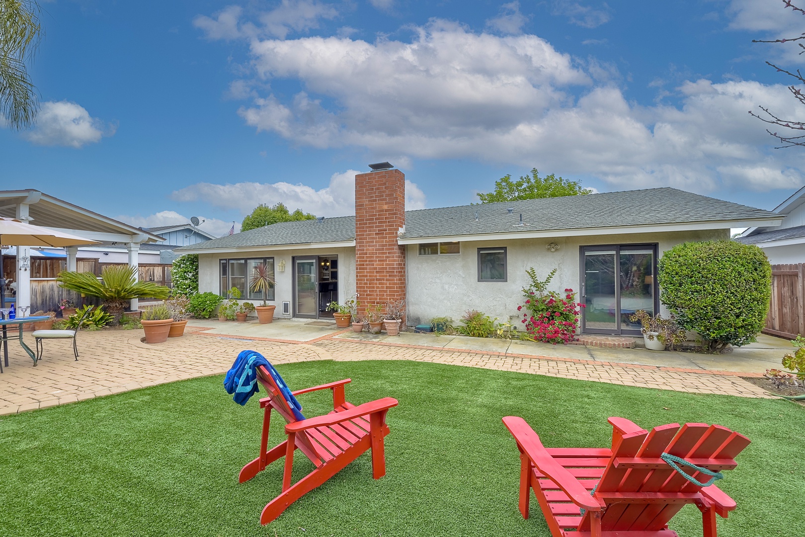 Experience serenity in the backyard oasis, ideal for gatherings & alfresco dining