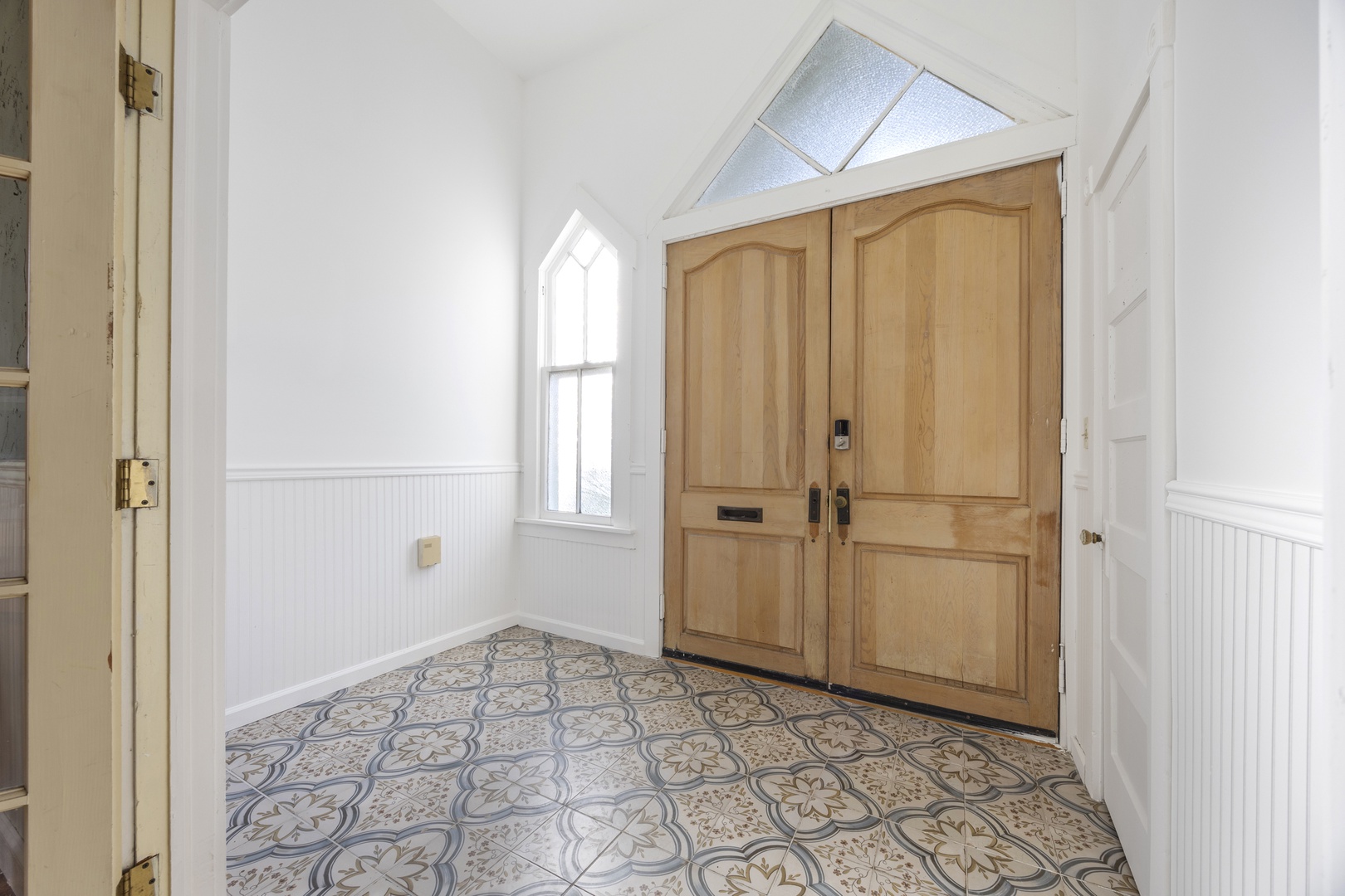 A bright, cheerful entryway will welcome you home