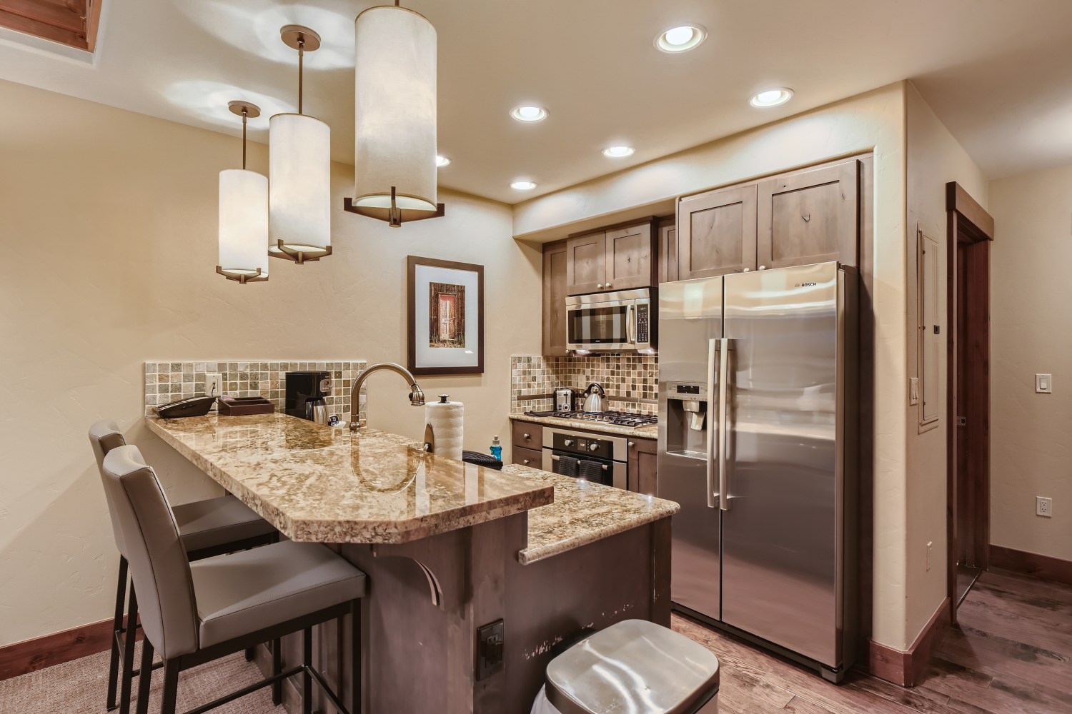 Kitchen with large refrigerator