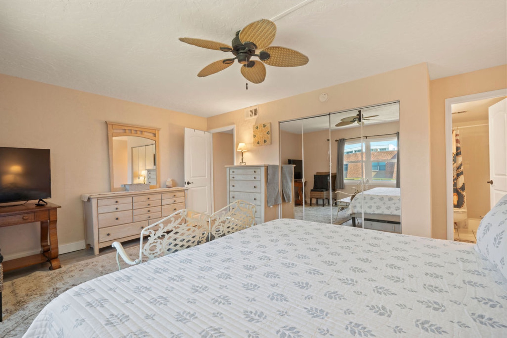Cozy bedroom with king bed, Smart TV, and ensuite