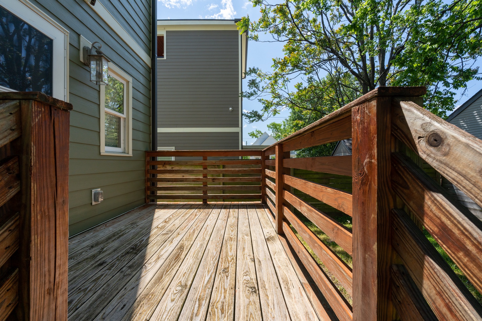Head inside via the spacious back deck after parking in the Driveway