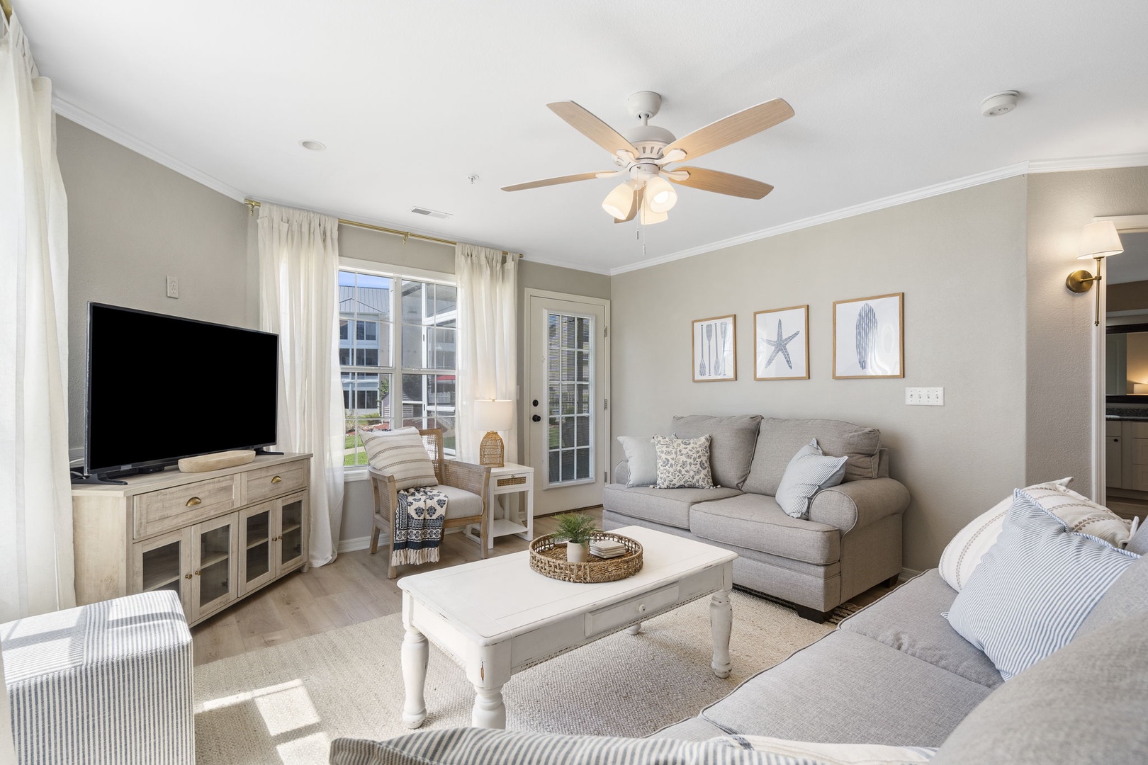Curl up for a movie or a show in the airy, comfortable living room