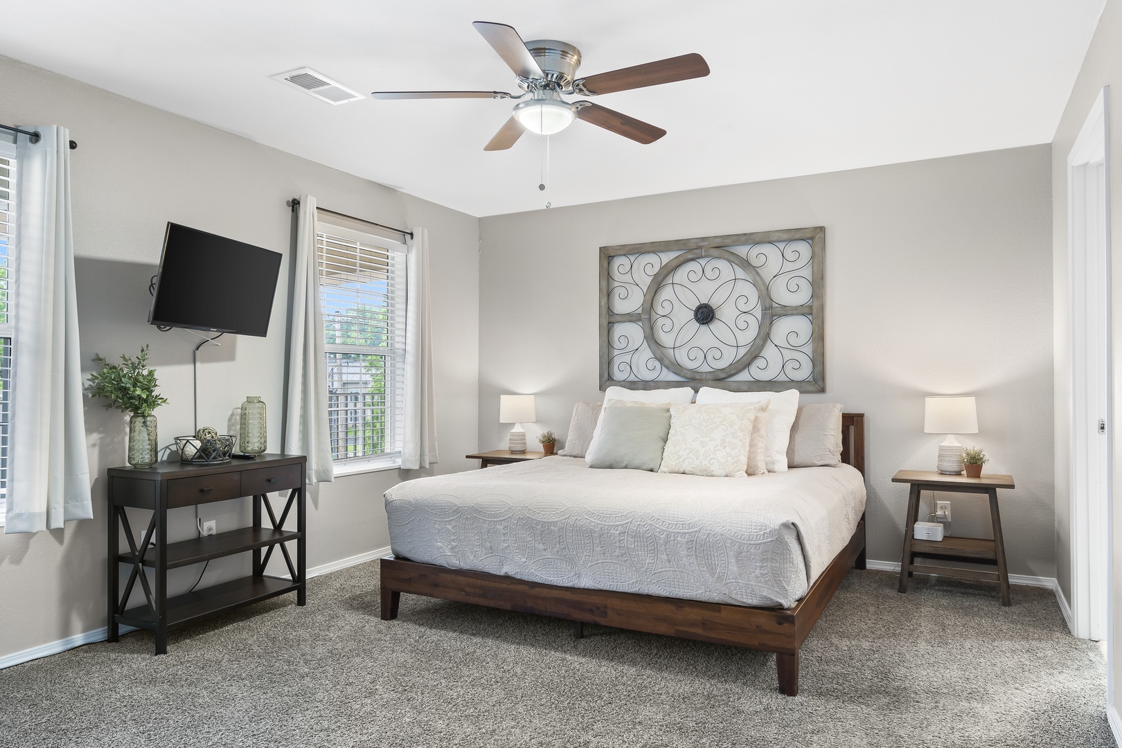 A plush king bed, private ensuite, & Smart TV await in this bedroom retreat