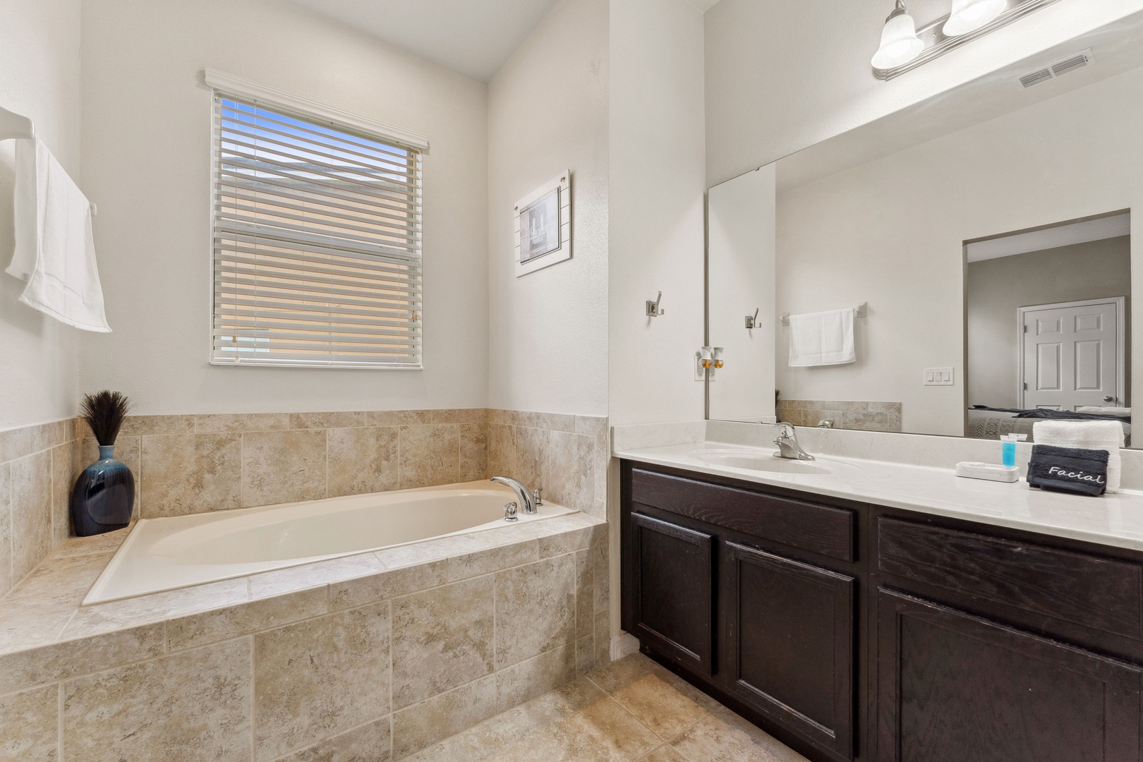 Ensuite bathroom with separate shower and soaking tub