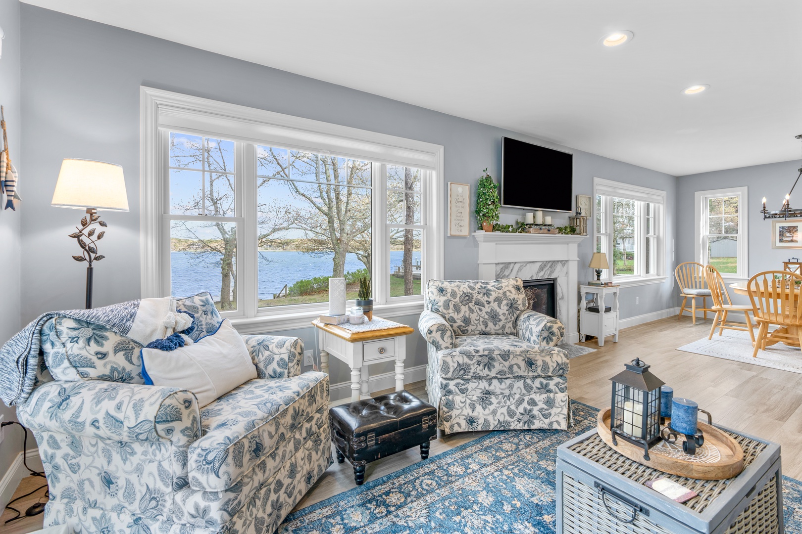 Bright living area with water view, and Smart TV