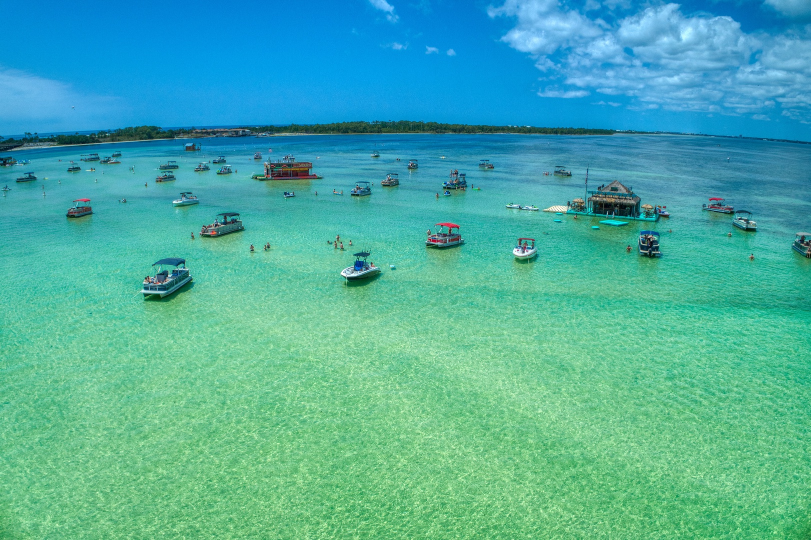 Join the fun in crystal-clear waters at Crab Island.