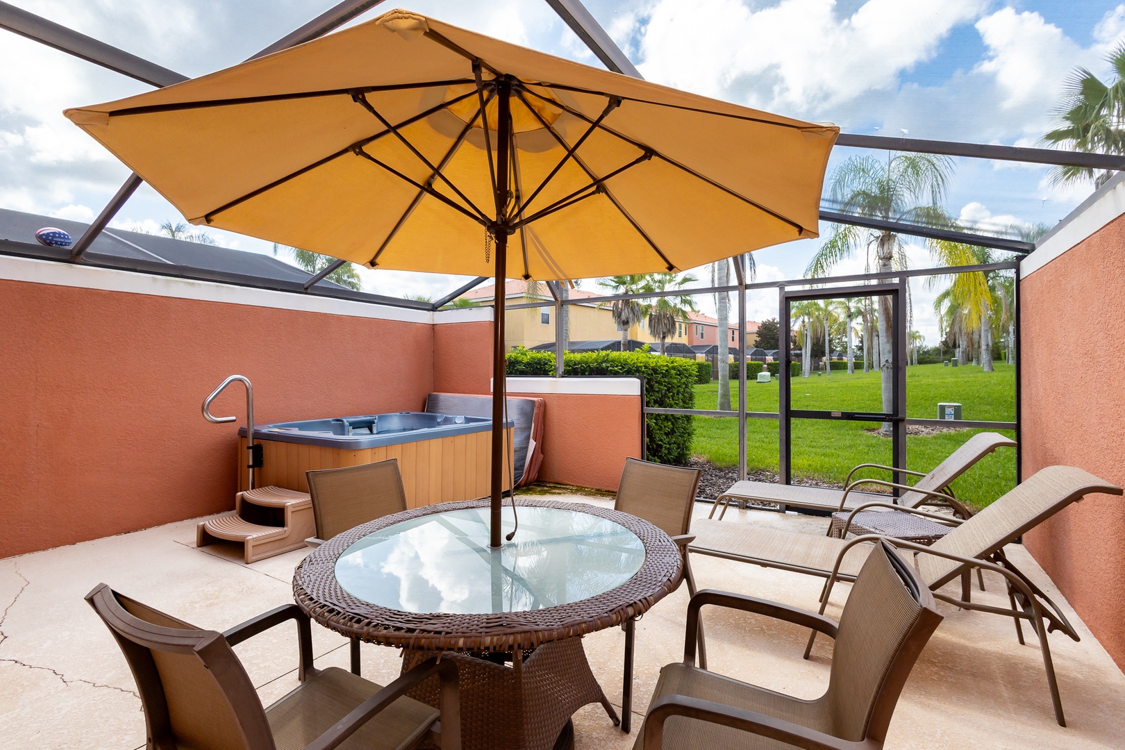 Enjoy shaded outdoor meals under the lanai