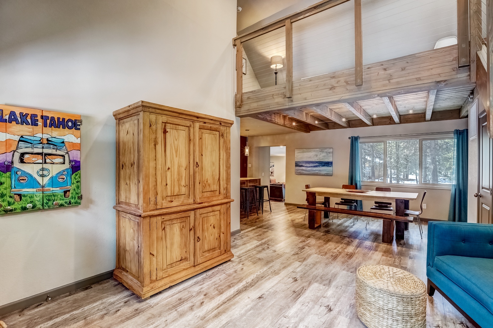 Enjoy the breezy open flow between the sitting room and kitchen/dining area