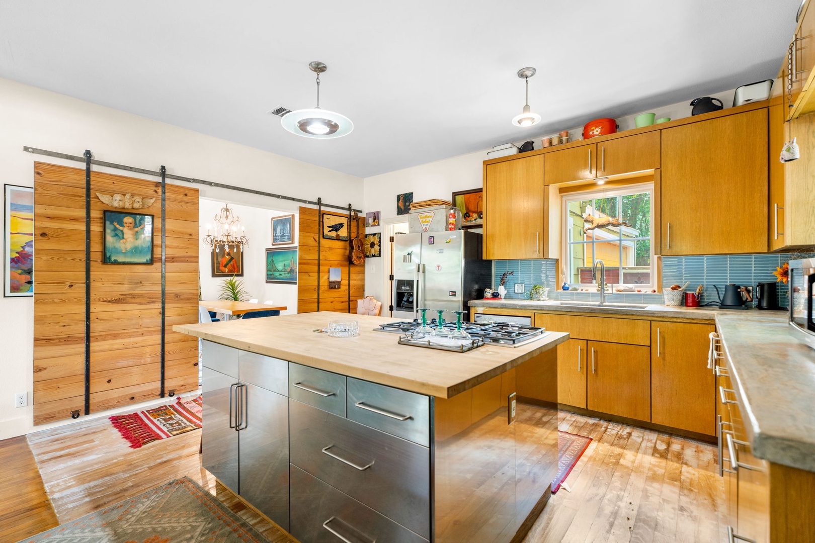 The large, colorful kitchen offers ample space & all the comforts of home