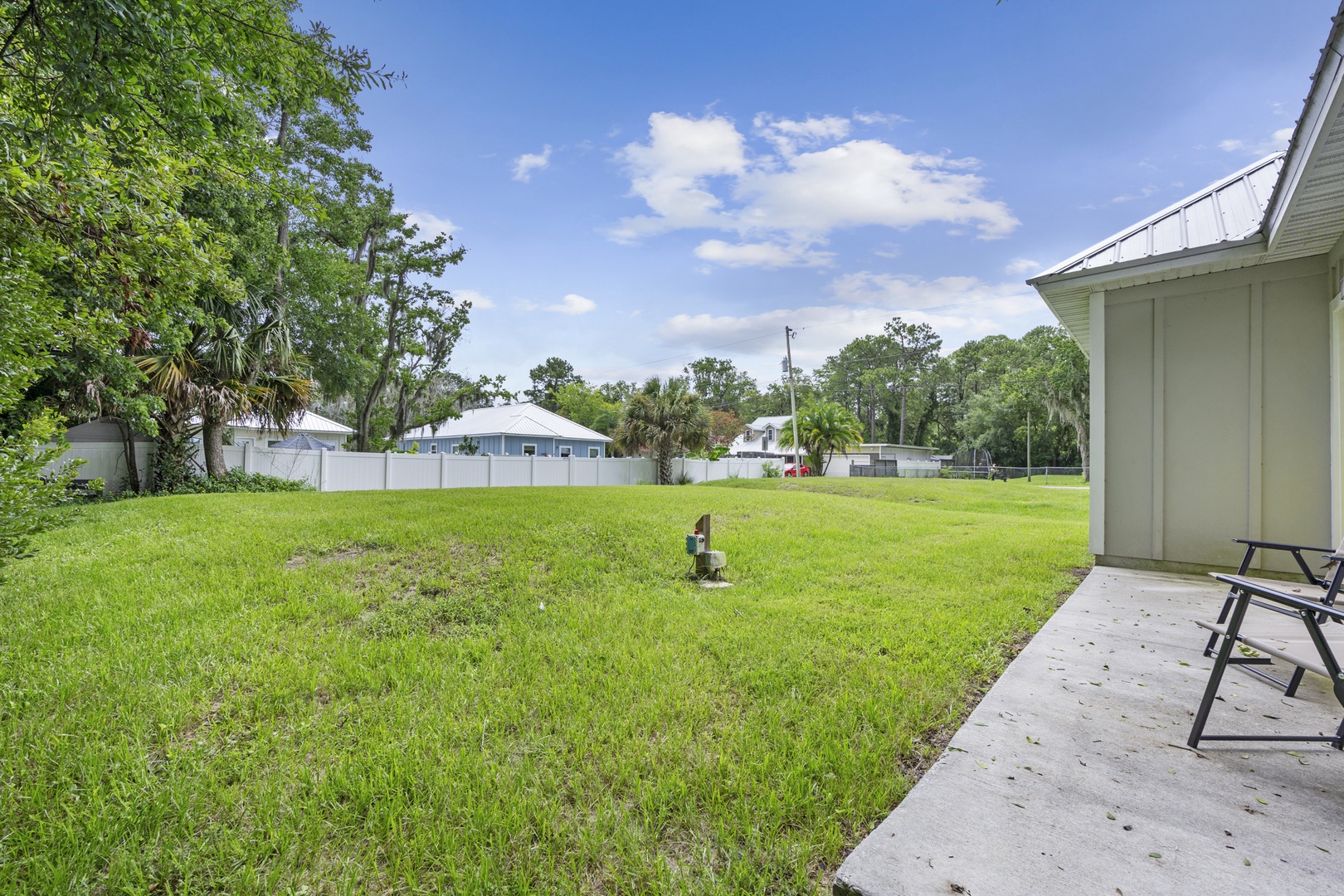 The large back yard offers ample space for relaxation & play