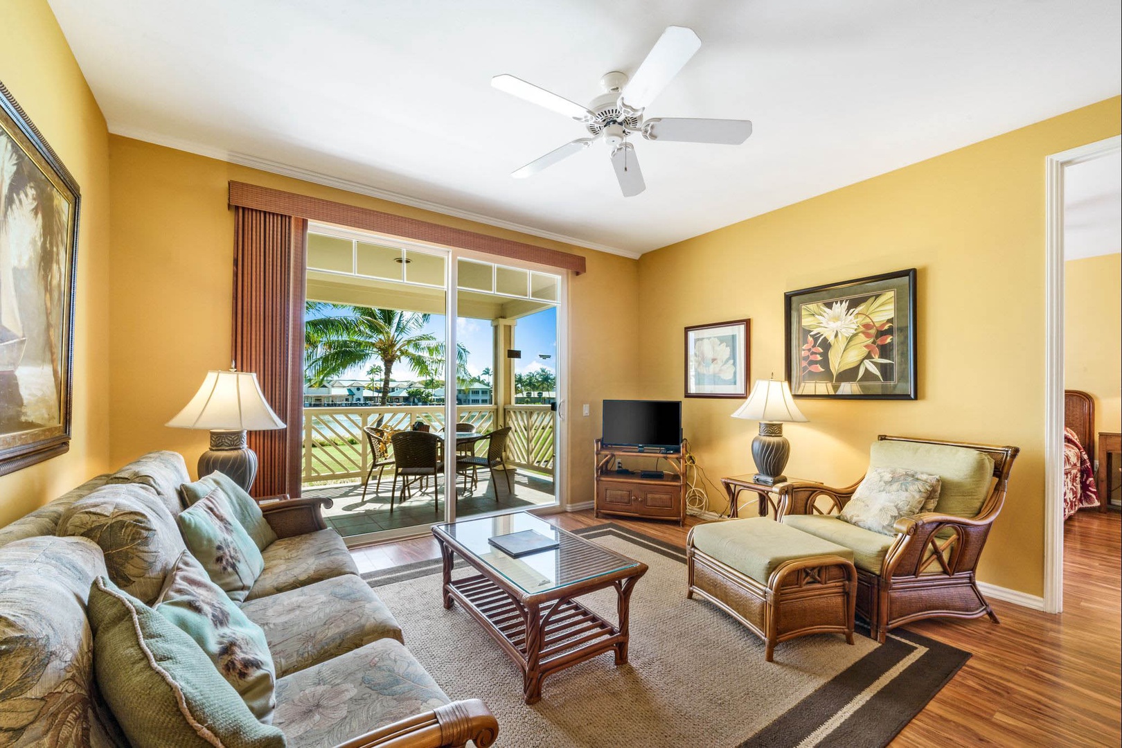 Golf course front living room with cable TV, DVD player and lanai access