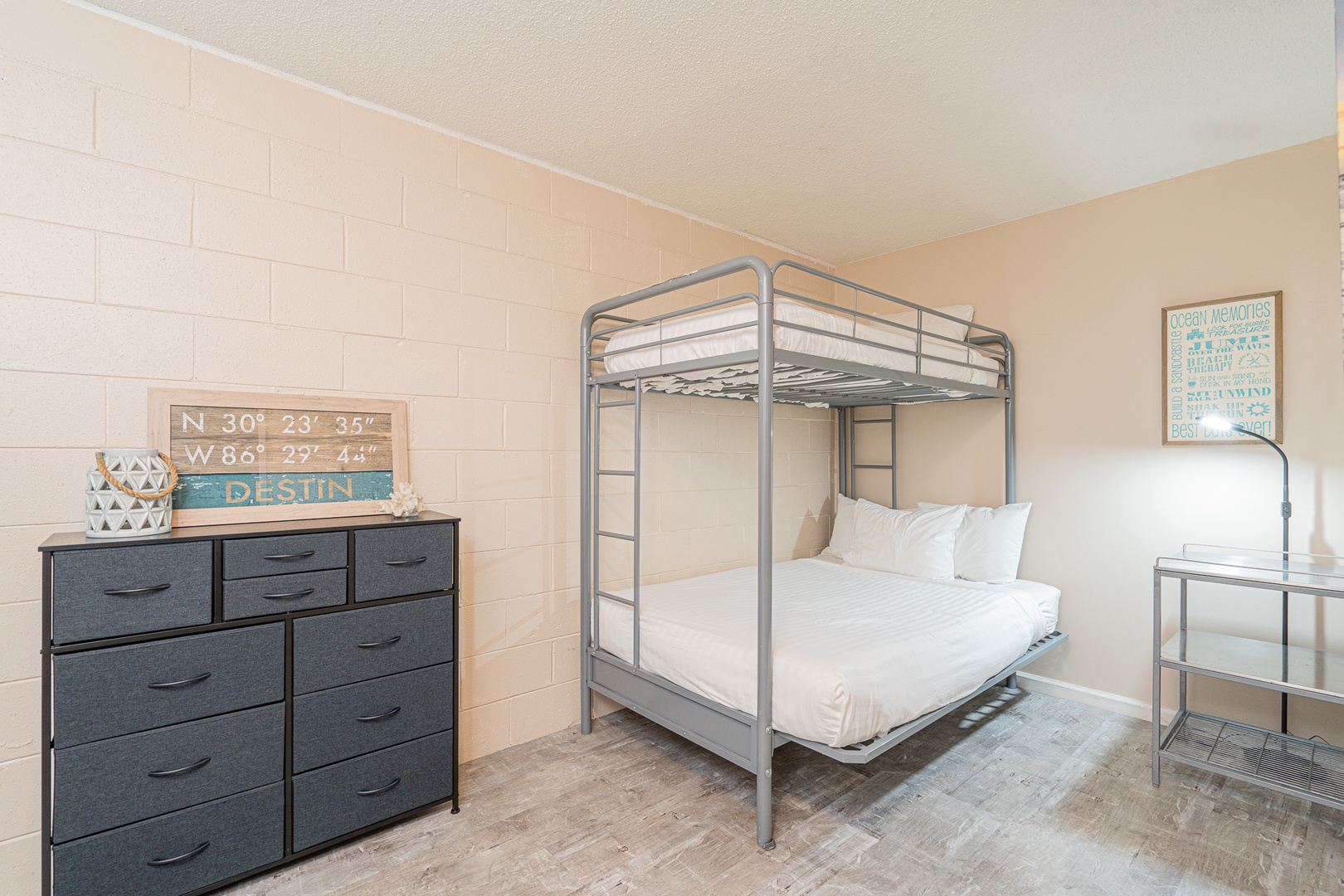 The game room sleeping area offers two twin-over-full bunkbeds & a Smart TV