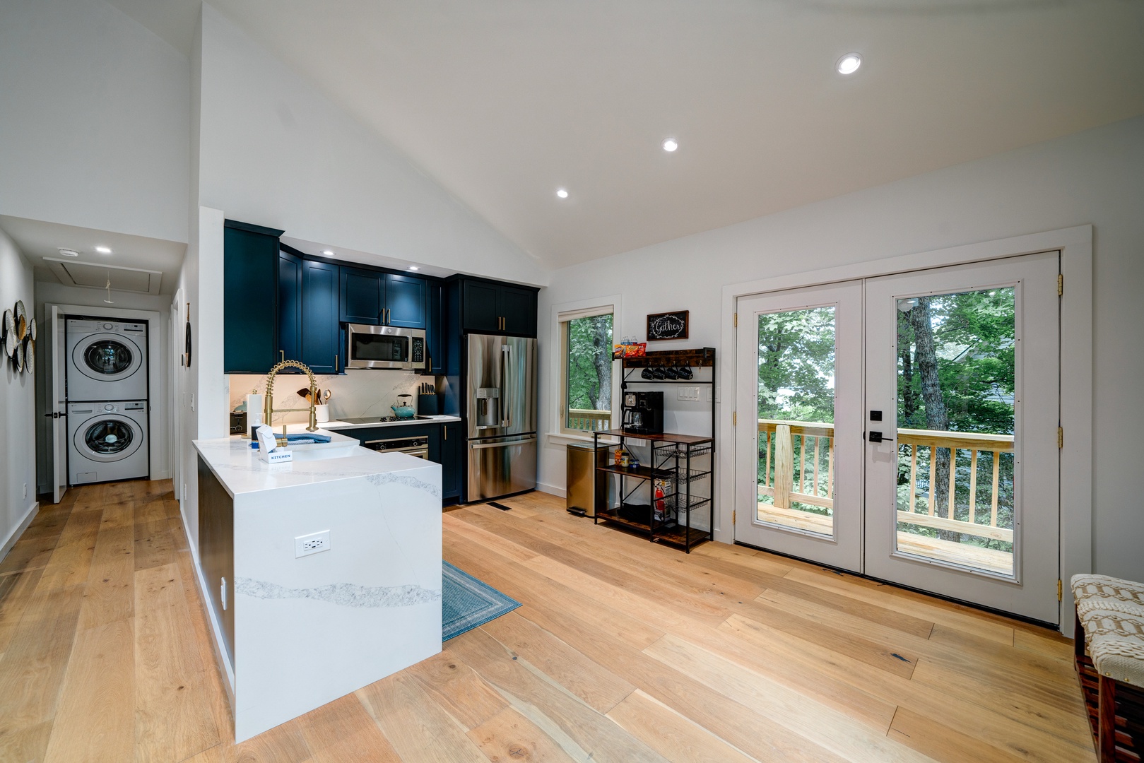 The bright, airy kitchen offers ample space & every home comfort