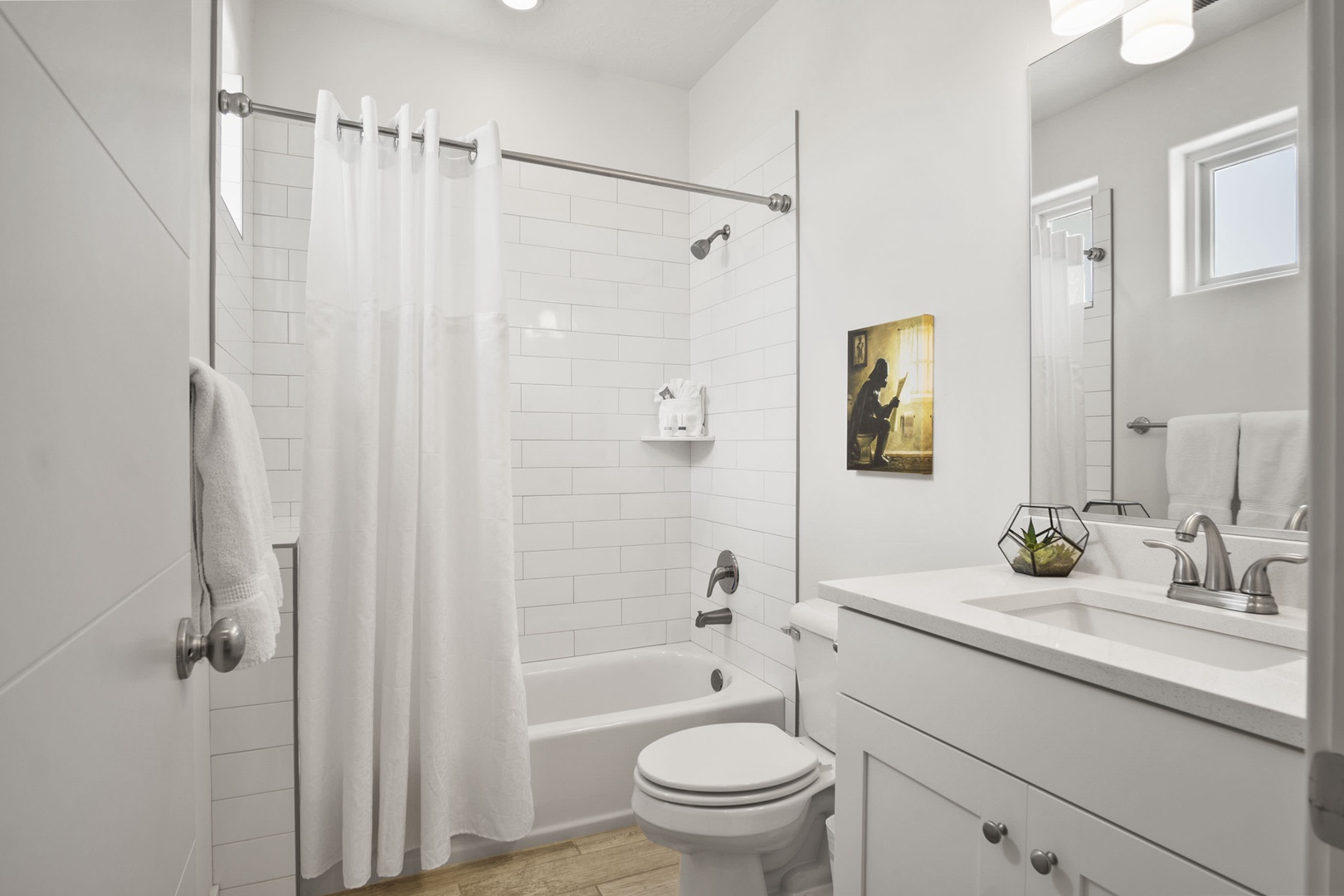 2nd floor en suite (to Bedroom 3), offering a single vanity and shower/tub combo