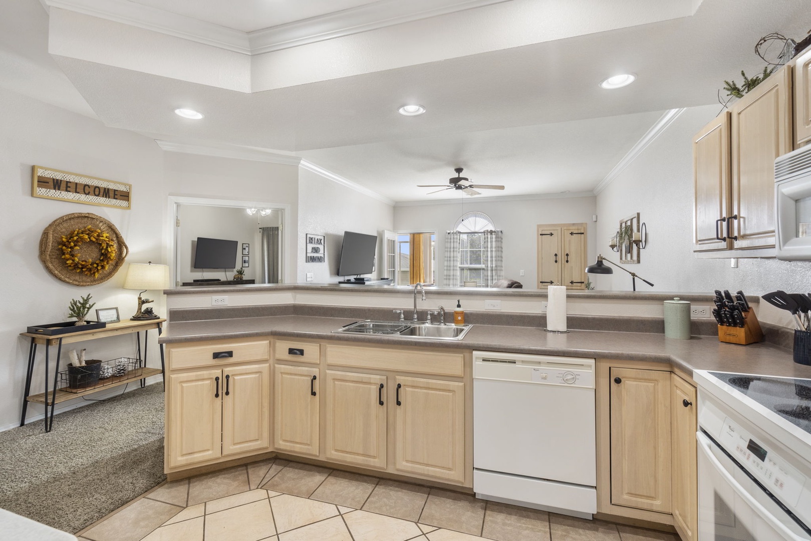 The open, airy kitchen is spacious & offers all the comforts of home
