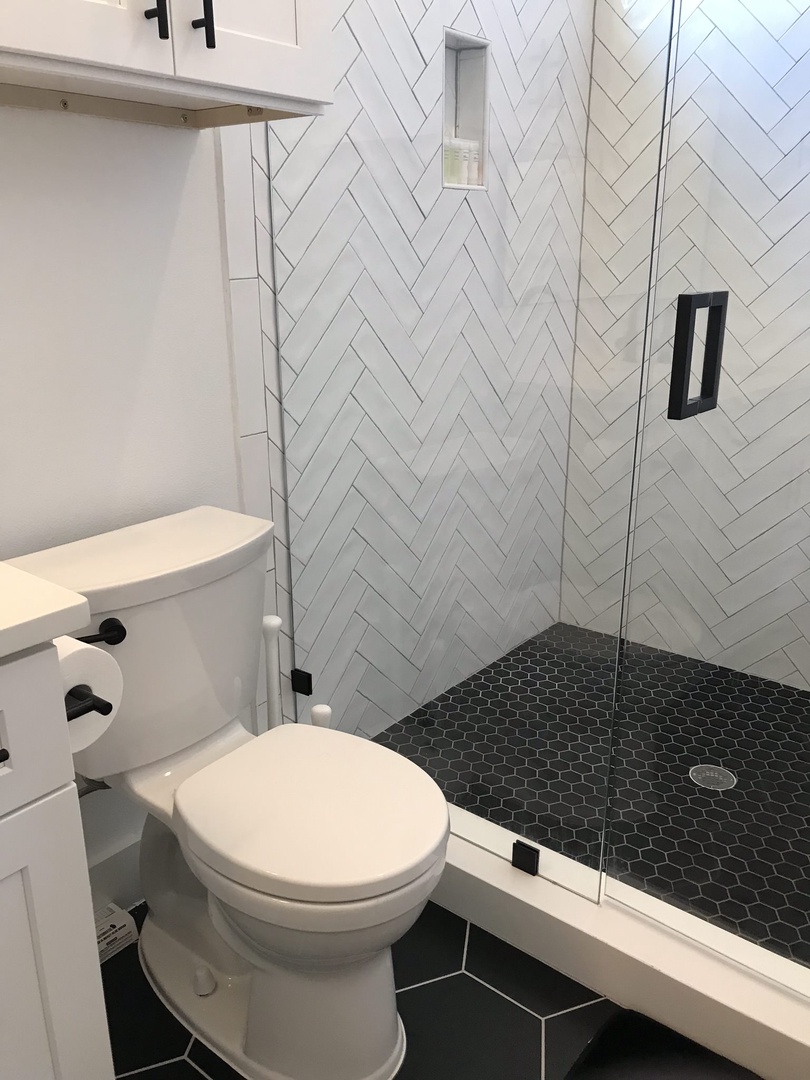 En suite bathroom with standing shower