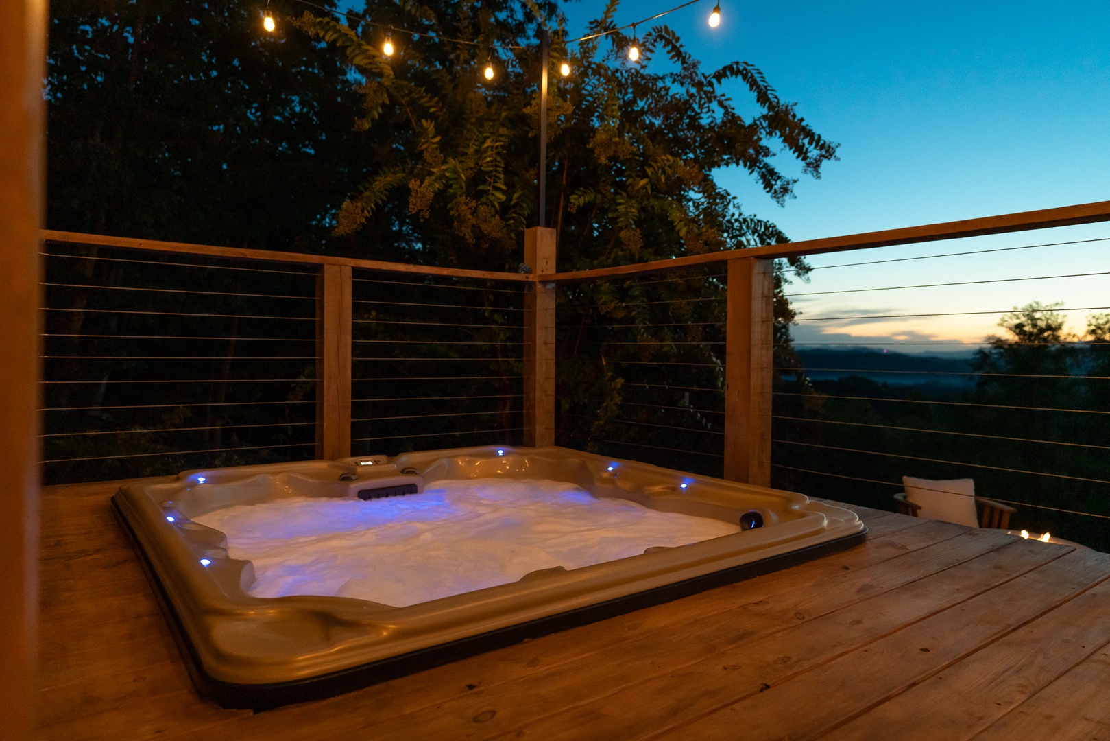 Bask in bubbling bliss in the private hot tub while you take in the sights