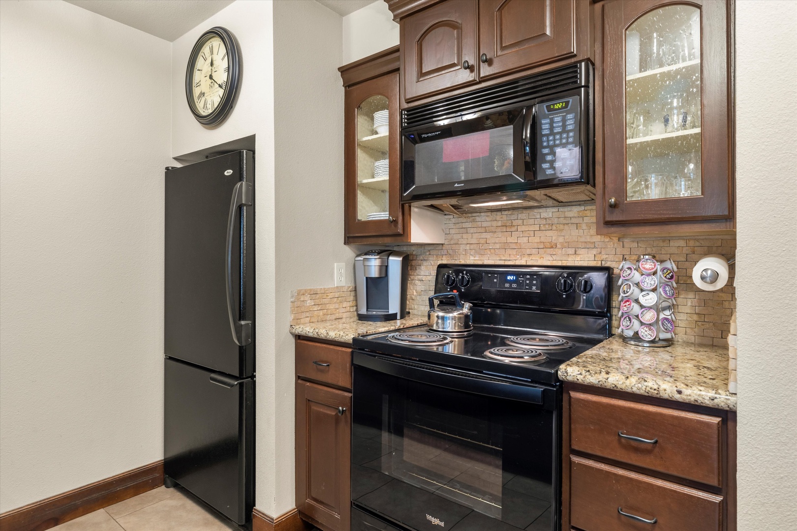 The updated kitchen offers ample space & all the comforts of home