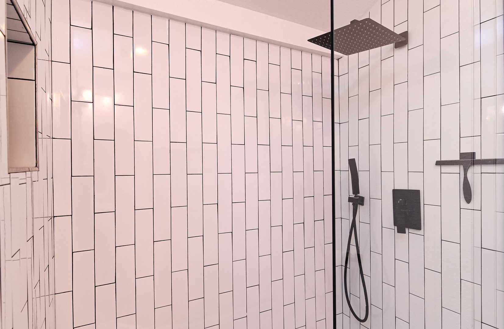 The king en suite bathroom includes a spacious vanity & walk-in shower