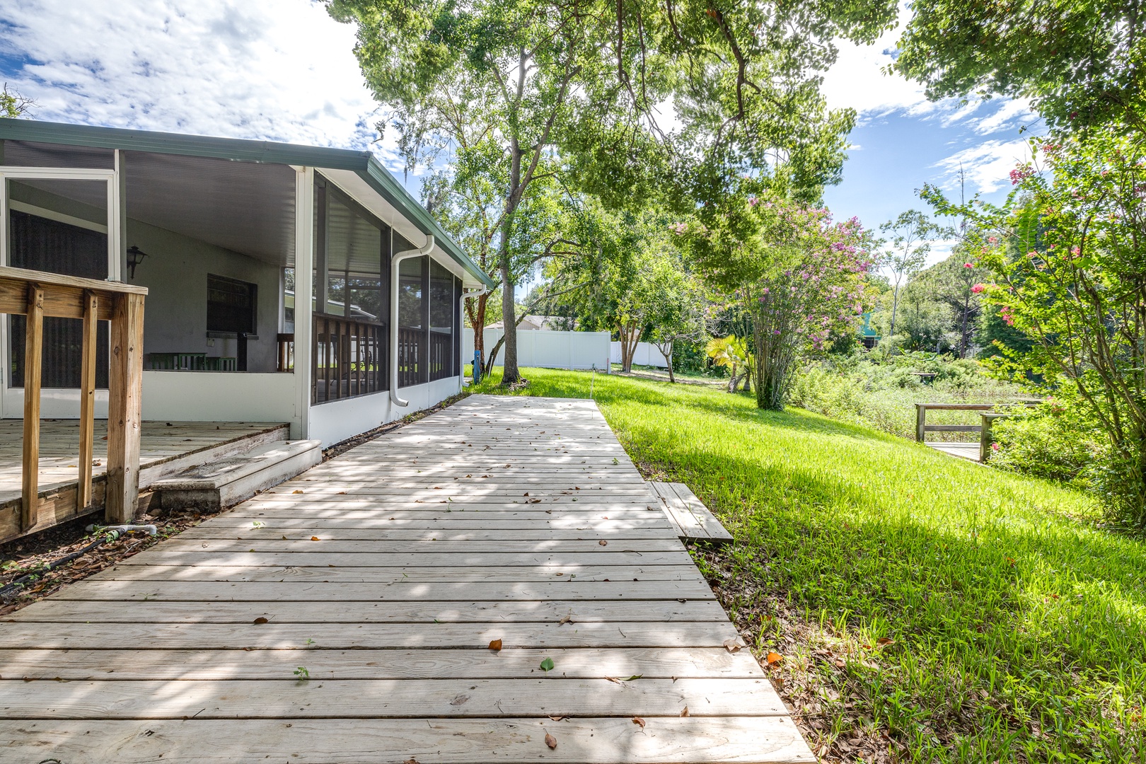 The large back yard offers loads of space for relaxation & play