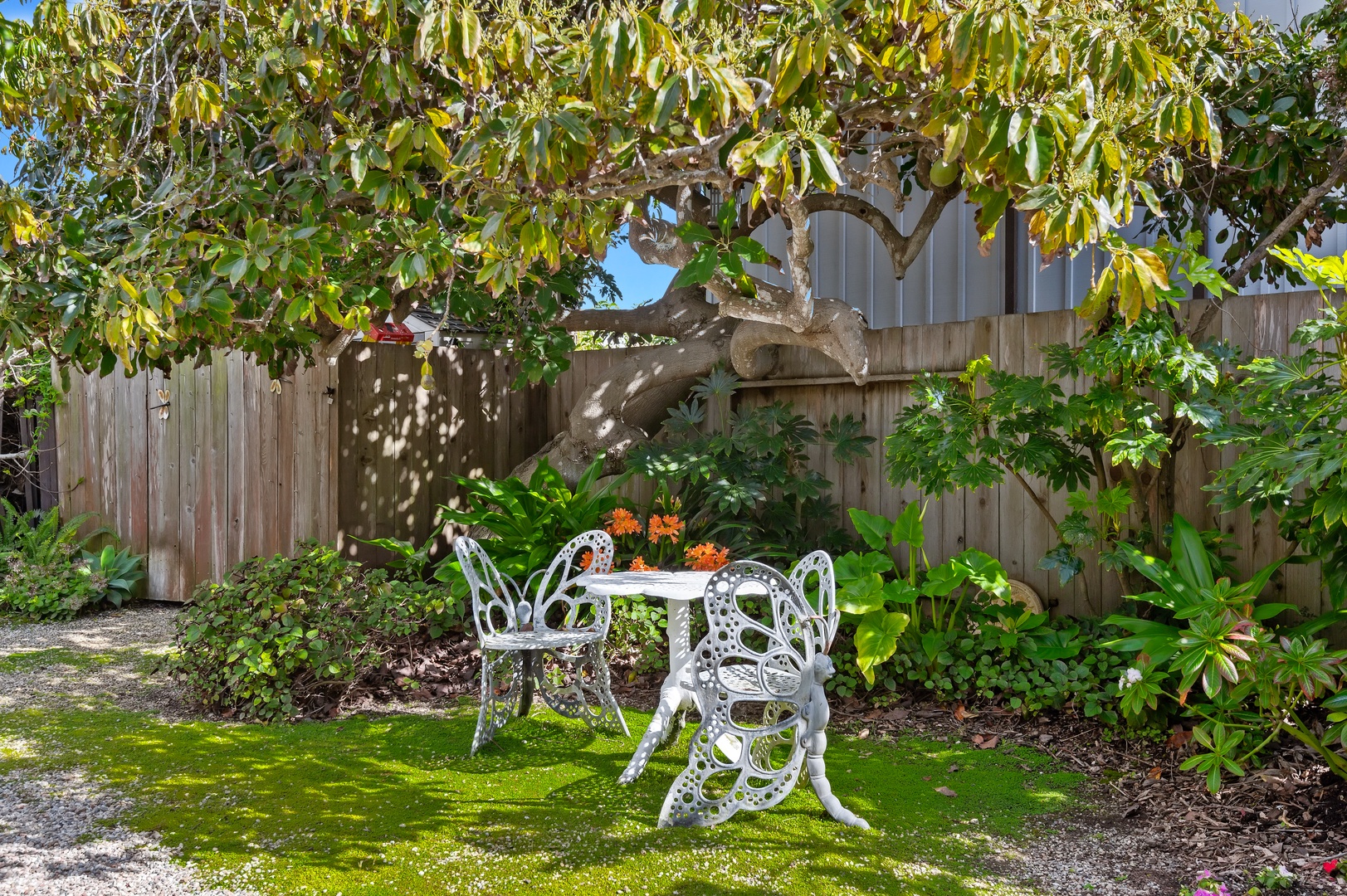 Take tea under the shade of one of this home’s fruit trees at this outdoor Dining Table with seating for 2