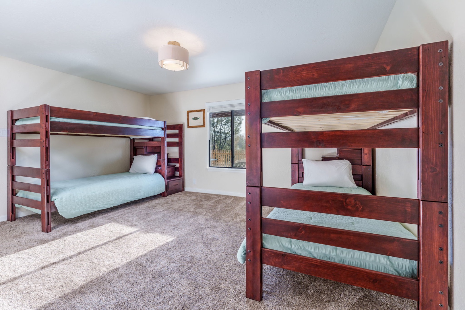 The Lower-Level Bunk Room offers two Twin-Over-Twin Bunkbeds and lots of natural light