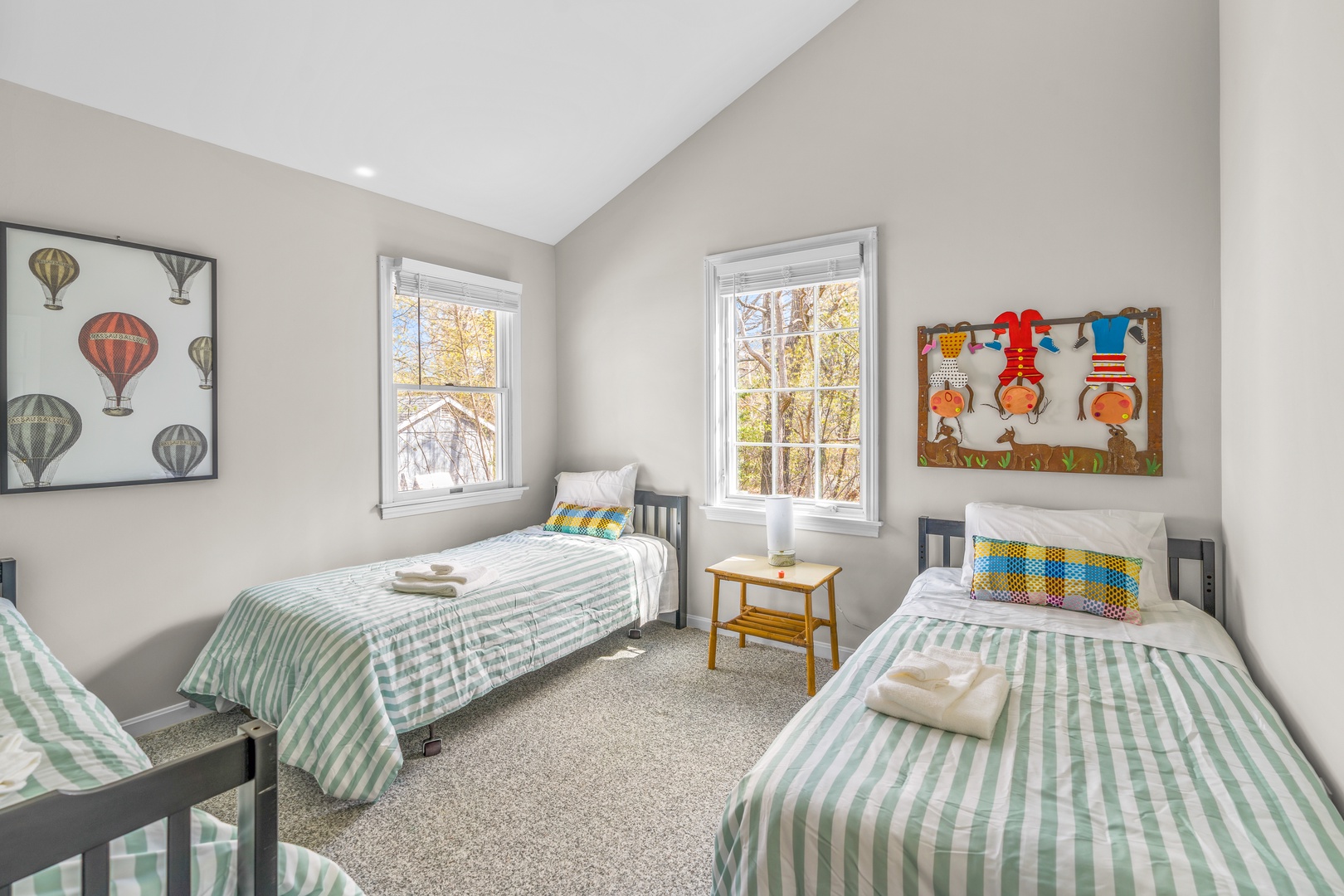 A trio of cozy twin beds is available in the final bedroom