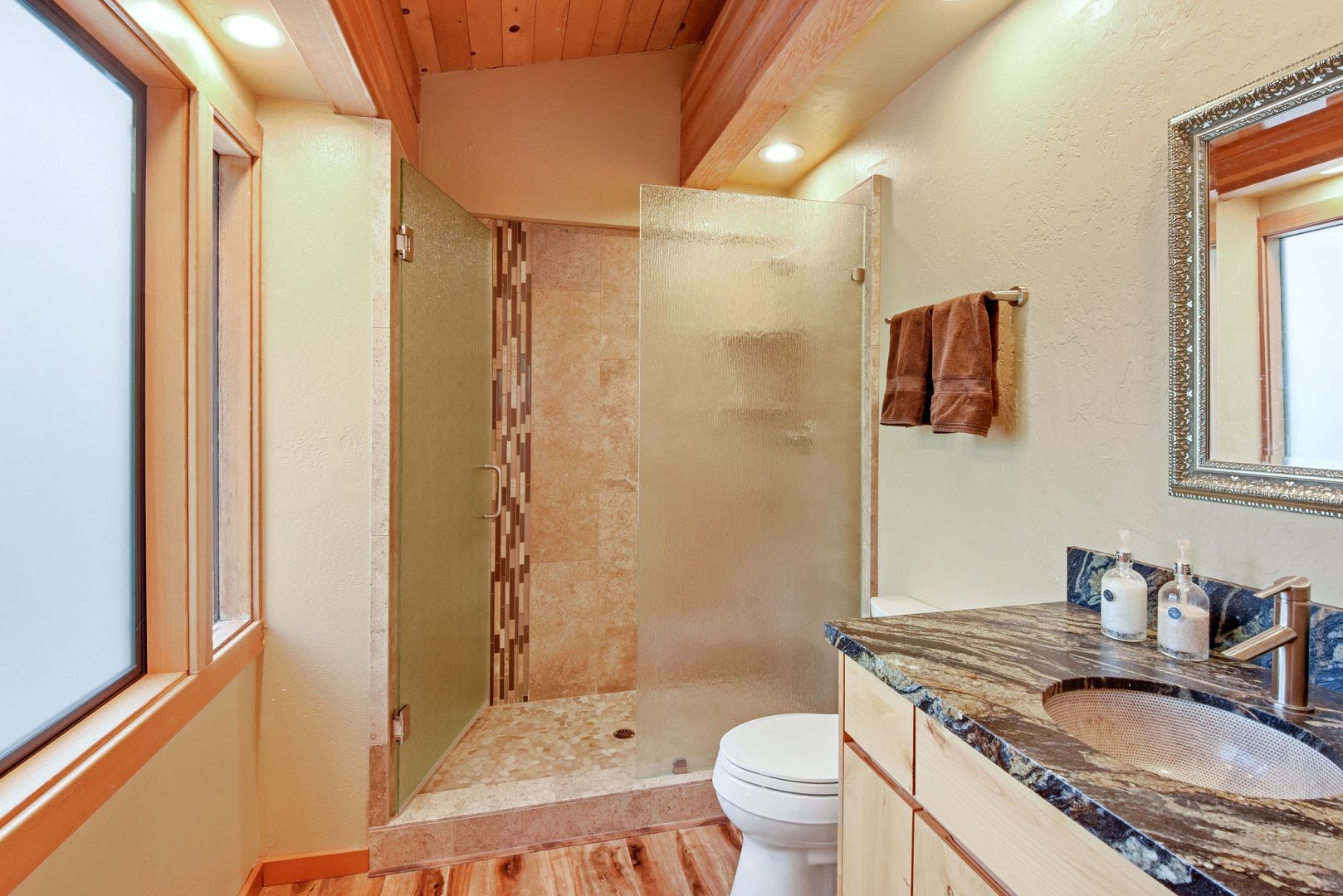En suite master bathroom with standing shower