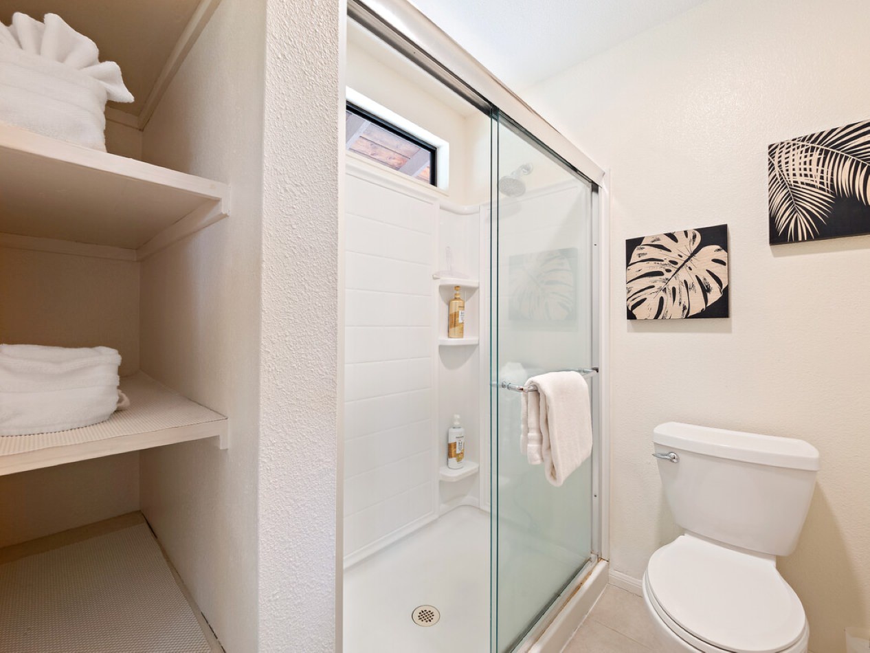 En-suite with dual sinks, and stand up shower