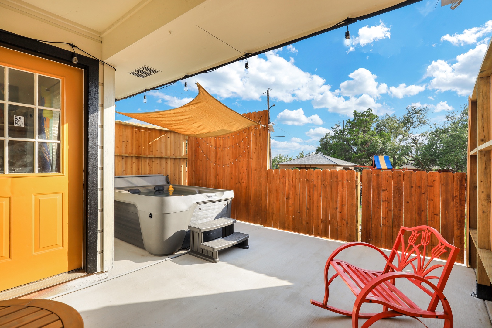 Lounge with a cocktail or soak in the private hot tub on the patio