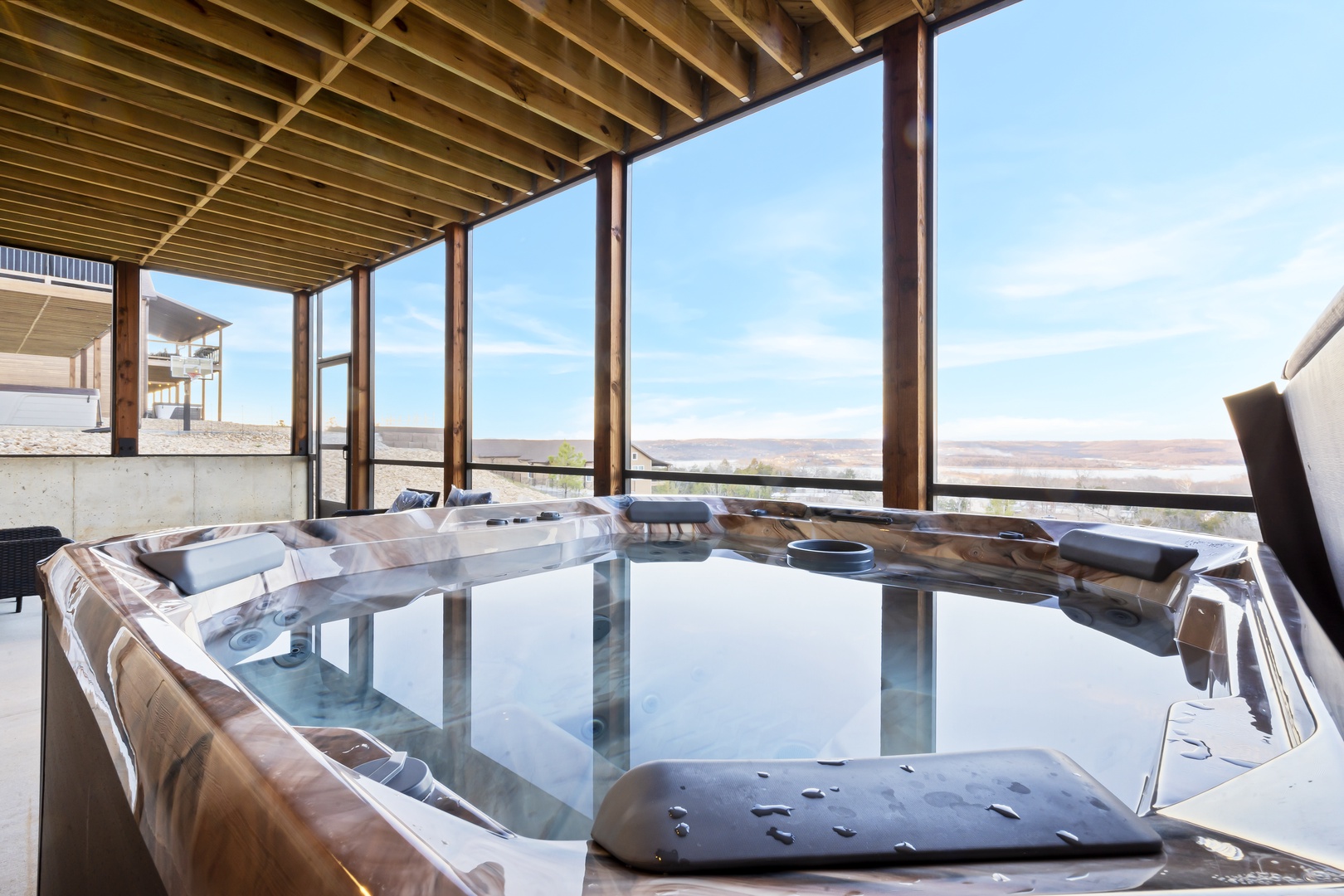 Relax in the private hot tub with spectacular views