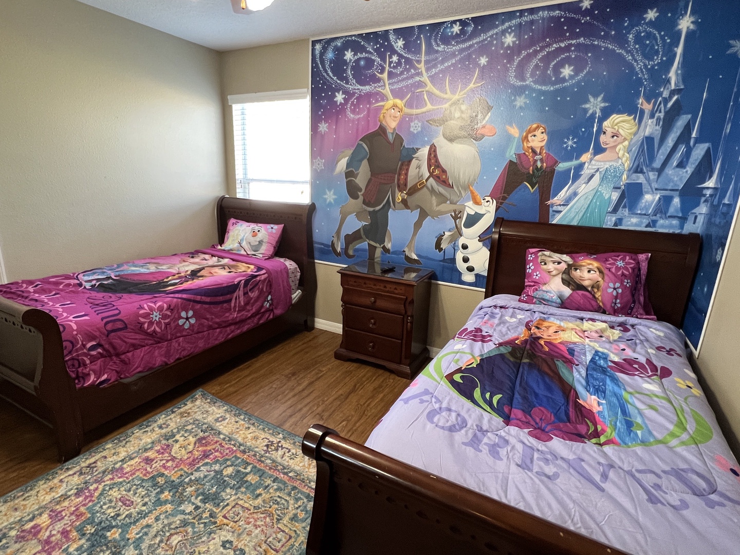 Frozen themed bedroom 2 with 2 Twin beds, and TV