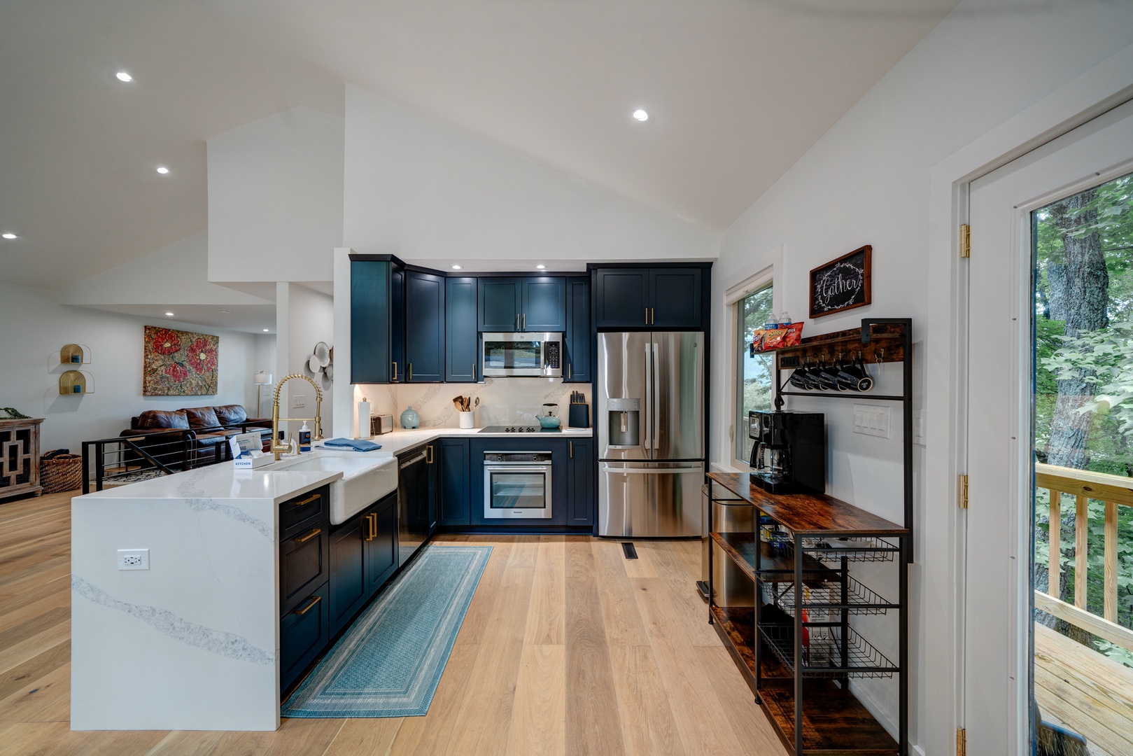 The bright, airy kitchen offers ample space & every home comfort